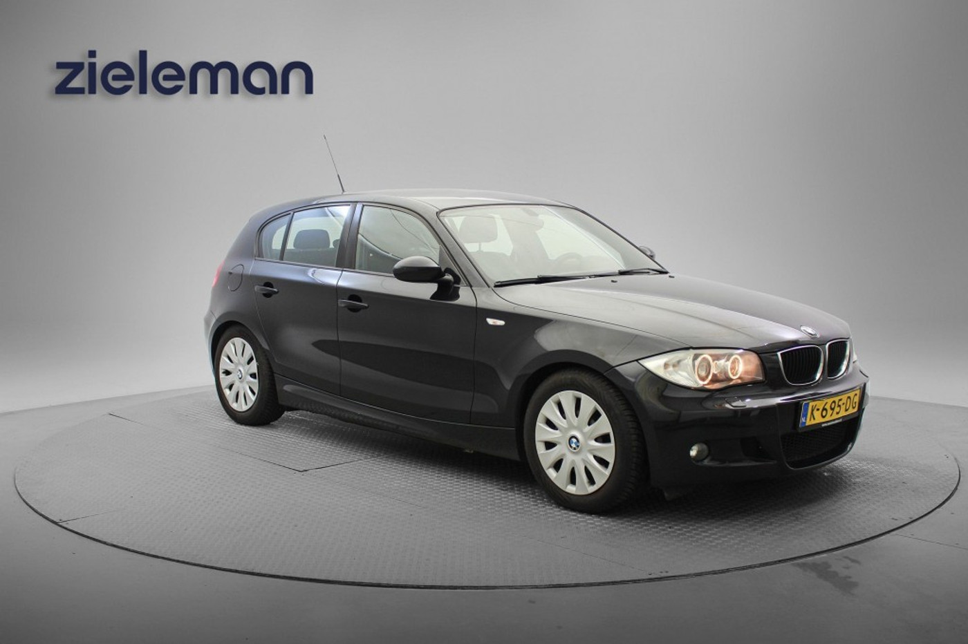 BMW 1er Reihe 116i - Airco, Half Leer, Stoelverwarming, Sportstuur 2009 - voorkant