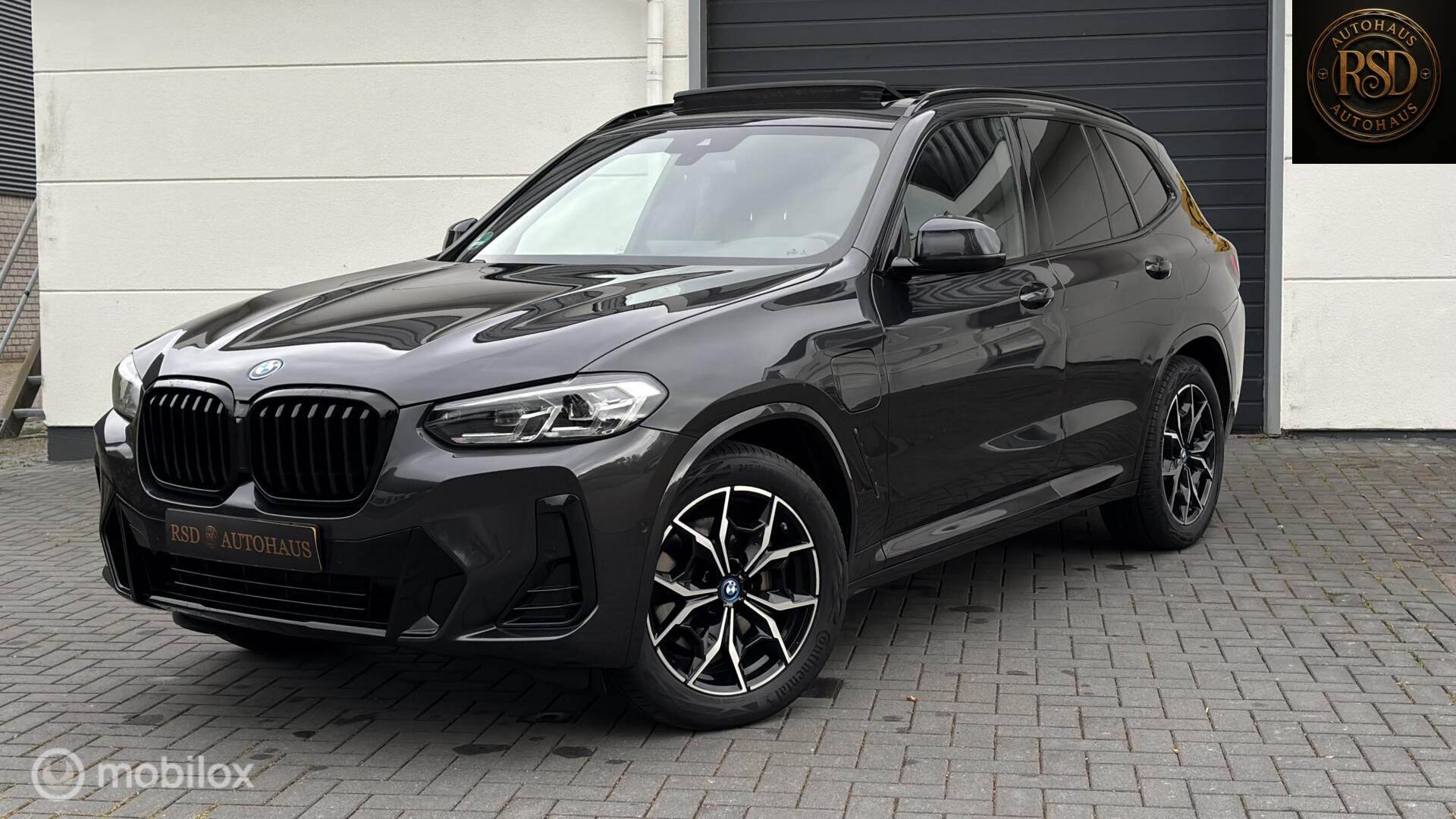 Foto van BMW X3 XDRIVE30E