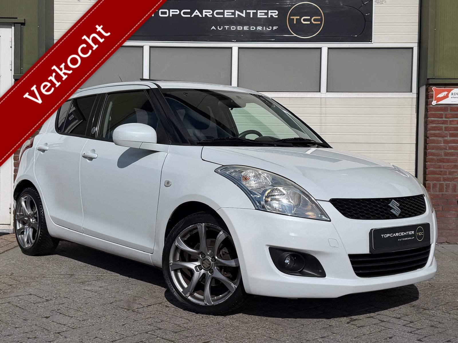 Suzuki Swift 1.2 Exclusive/AIRCO/AUT/PARKS/NAVI/5DRS/APK 2012 - voorkant