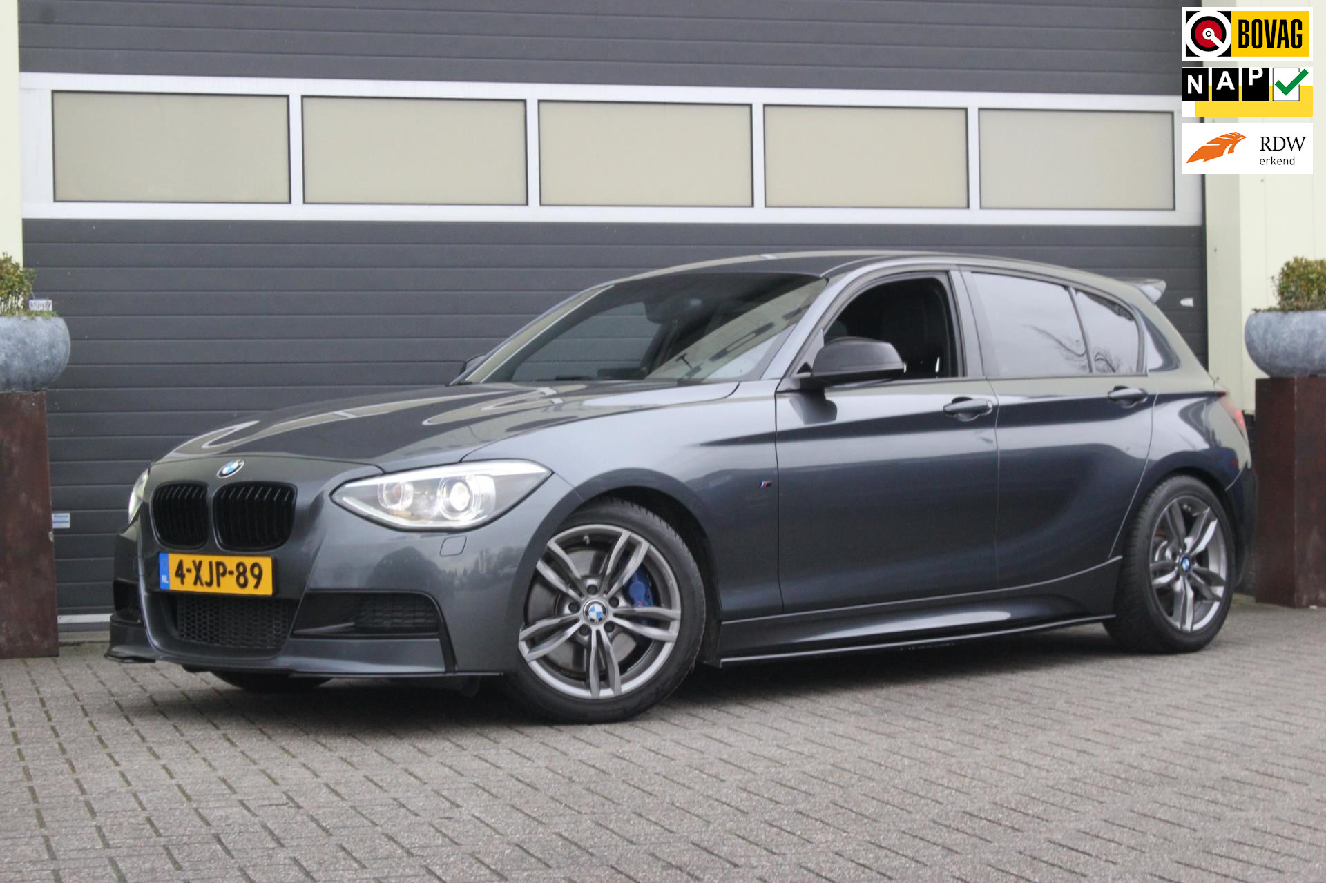 BMW M135i M135i High Executive M Sport | NAP | Leer | 2014 - voorkant