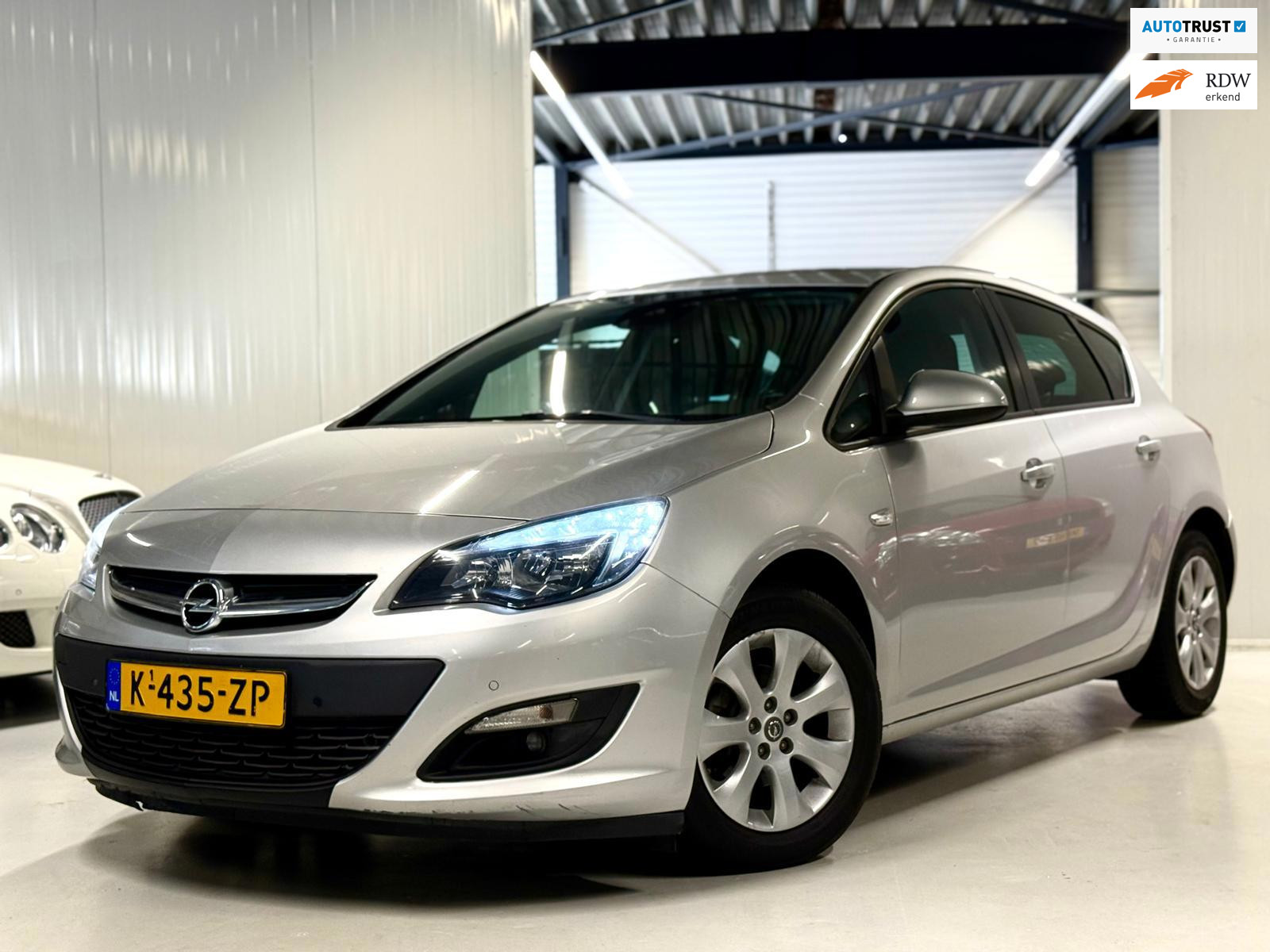 Opel Astra 1.4 Turbo 120PK Sport + Navi|Stoelverw. Trekhaak! 2015 - voorkant