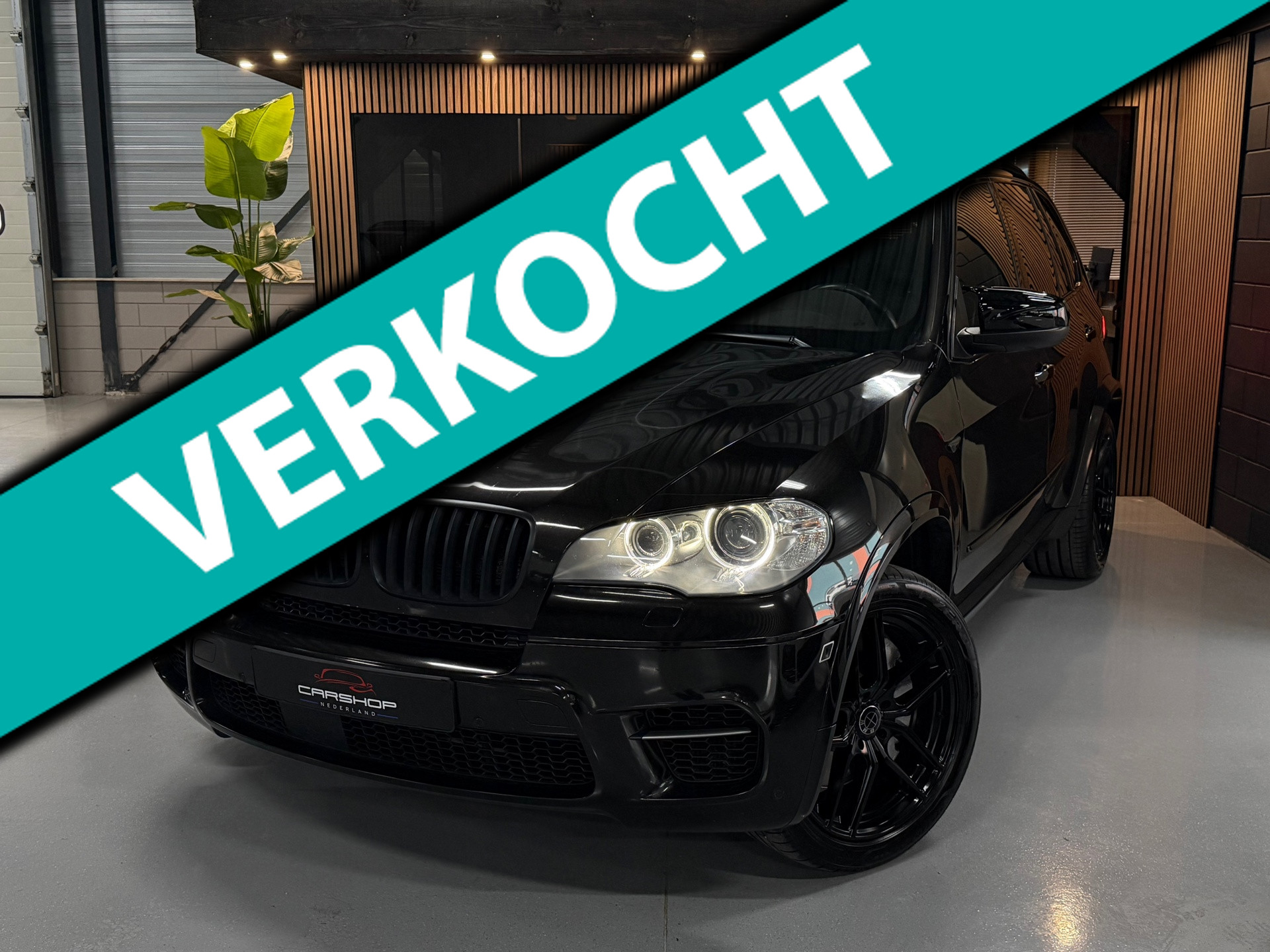 Foto van BMW X5 M50D
