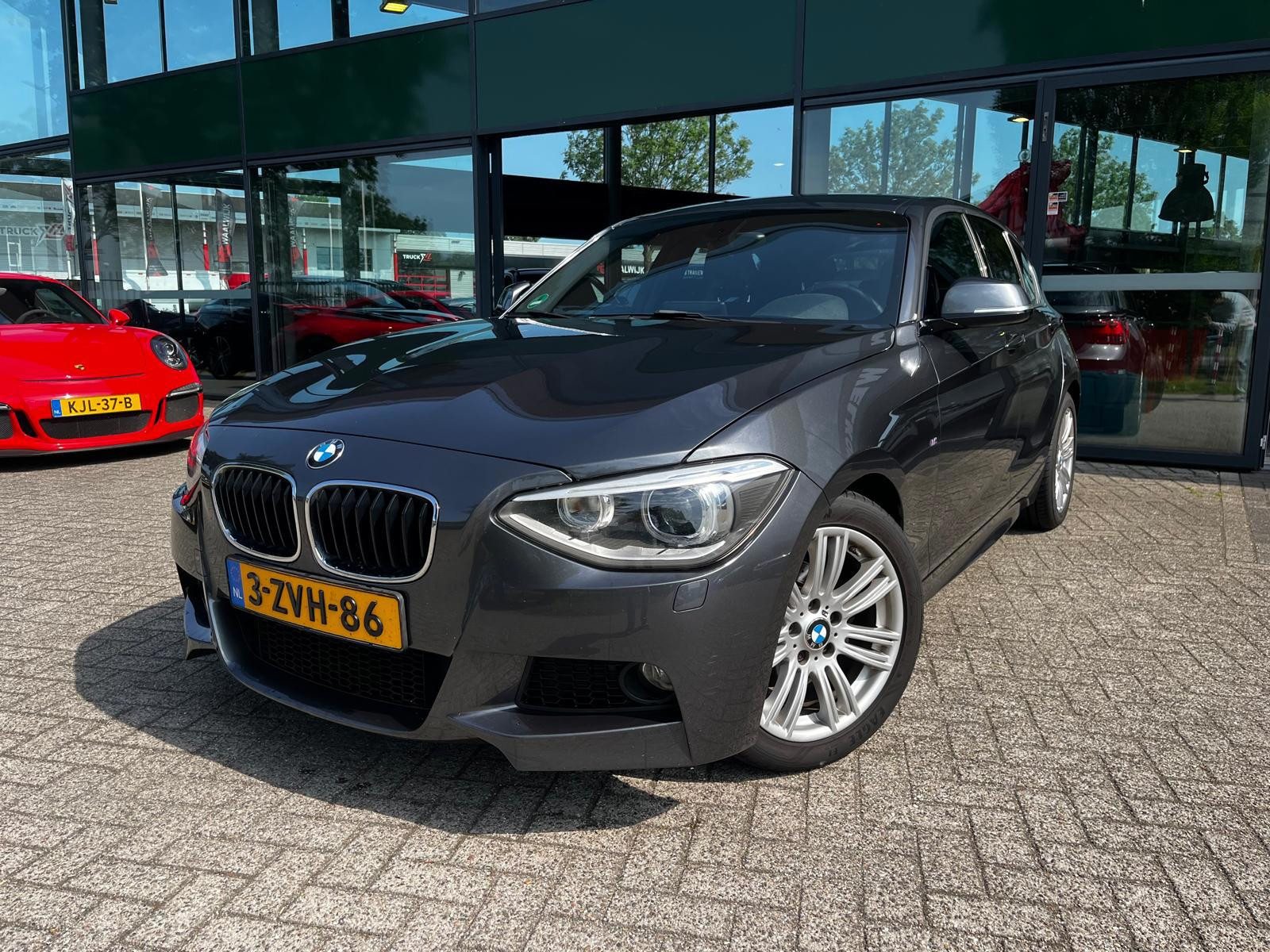 BMW 116i 116i Executive (M-Pakket, Parkeersensoren, NL-Auto, Goed Onderhouden) 2015 - voorkant
