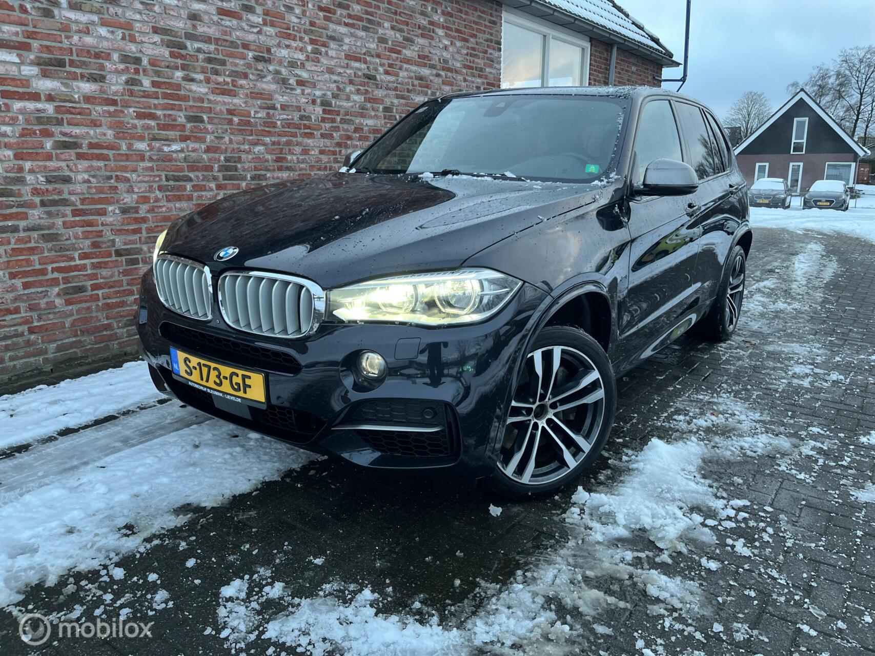 Foto van BMW X5 M50D
