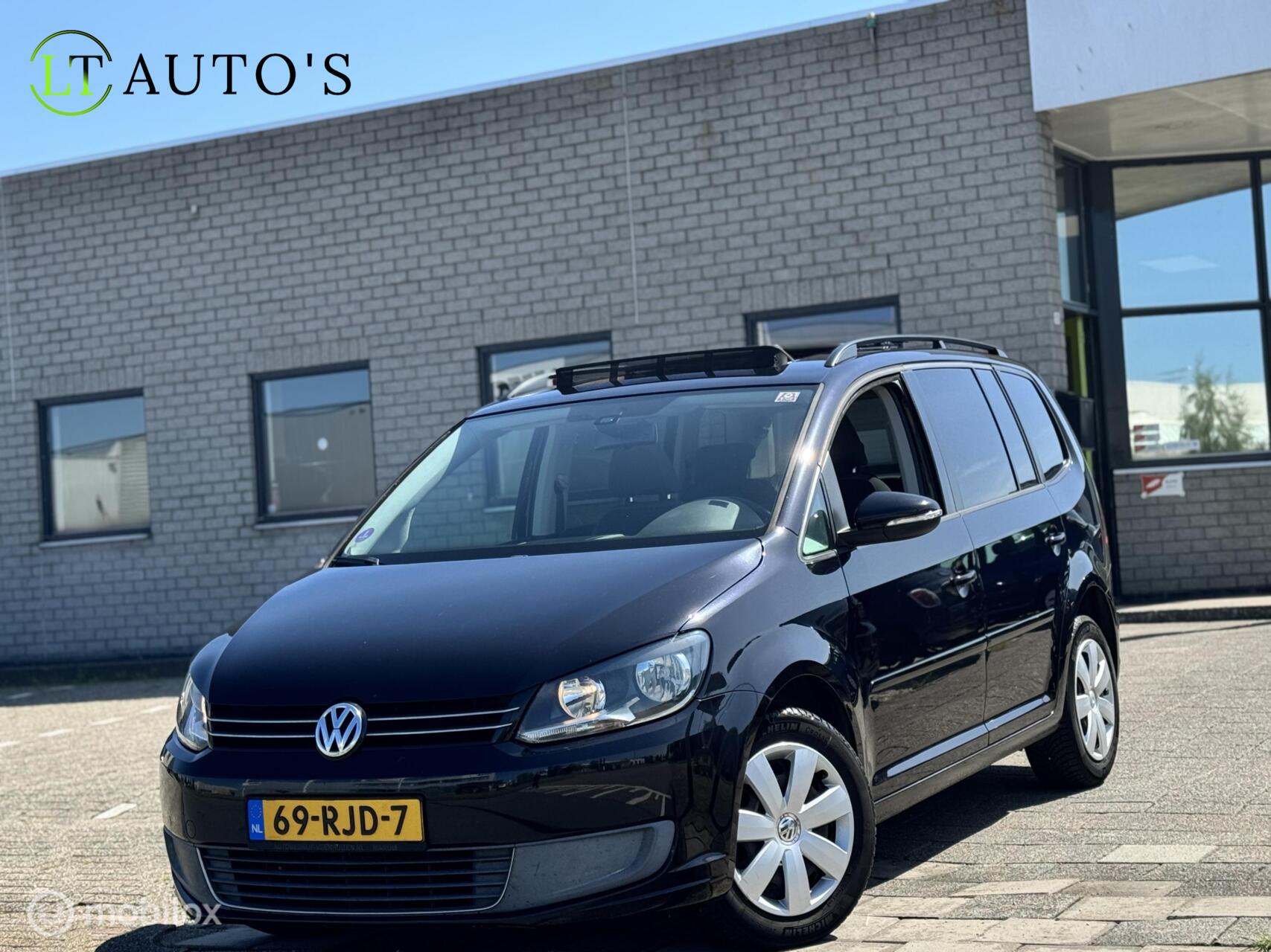 Volkswagen Touran 1.2 TSI Comfortline BlueMotion 7p.|Pano 2011 - voorkant