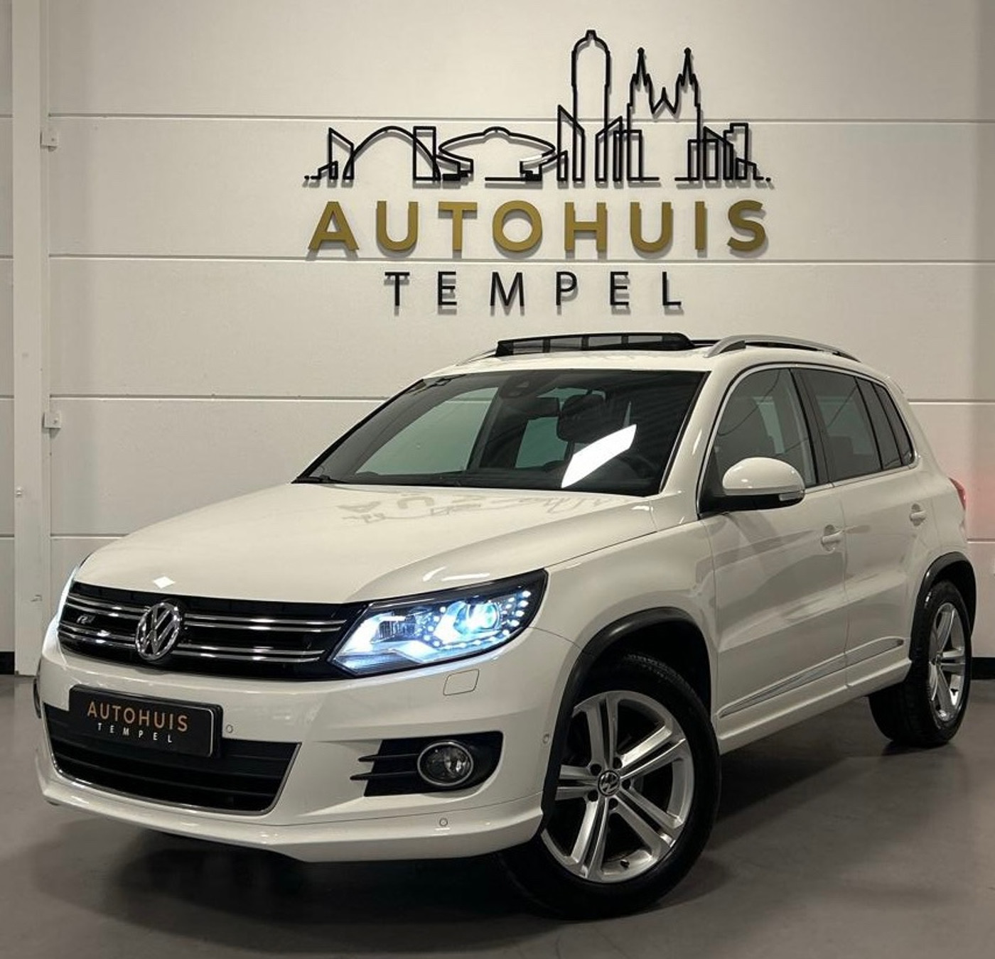 Volkswagen Tiguan 1.4 TSI Sport&Style 4motion R-line Edition Nap Pano Cruise Climate Led Pdc Navi Trekhaak Vol! 2013 - voorkant