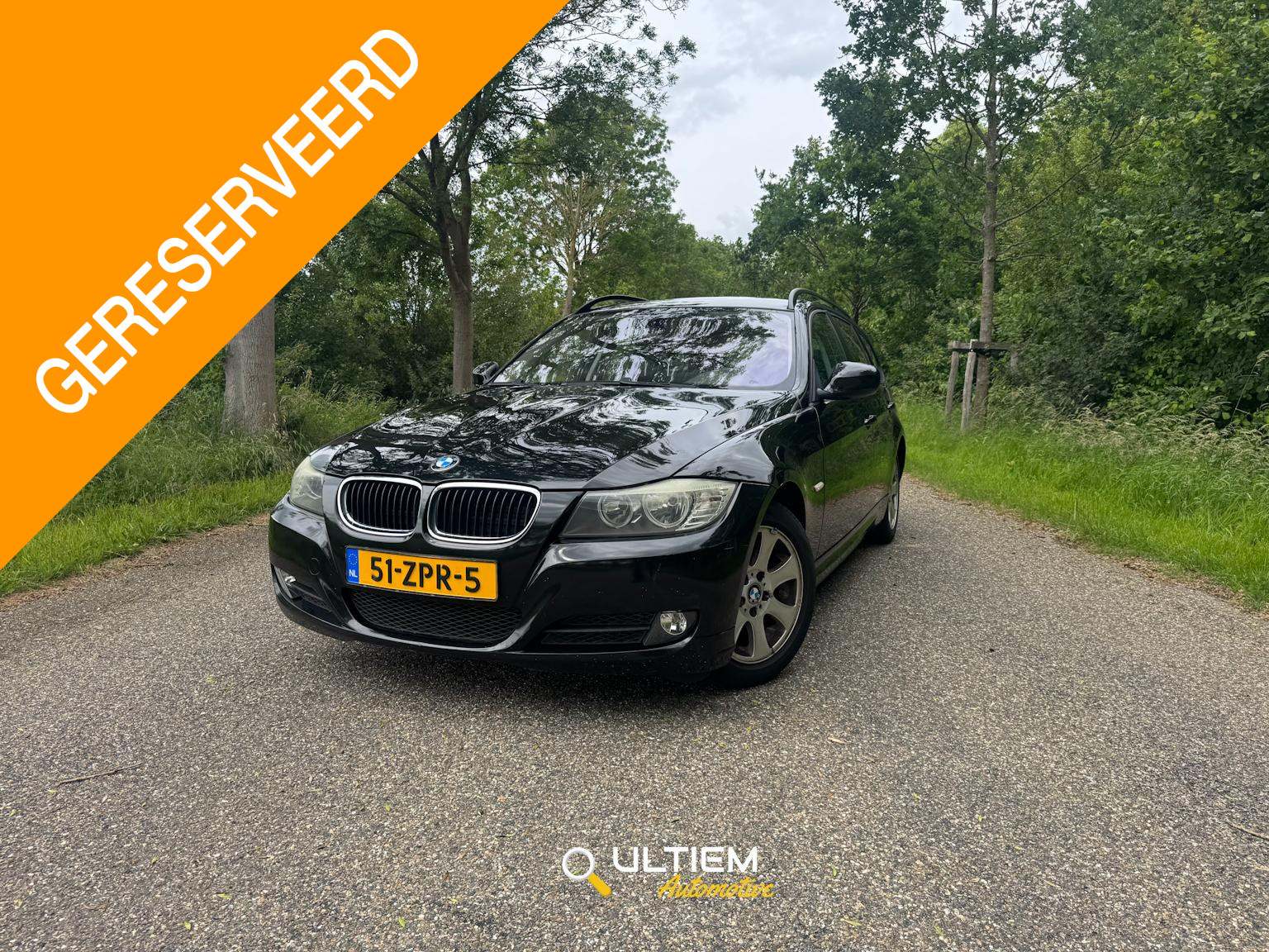 BMW 3er Reihe 318i 2009 - voorkant