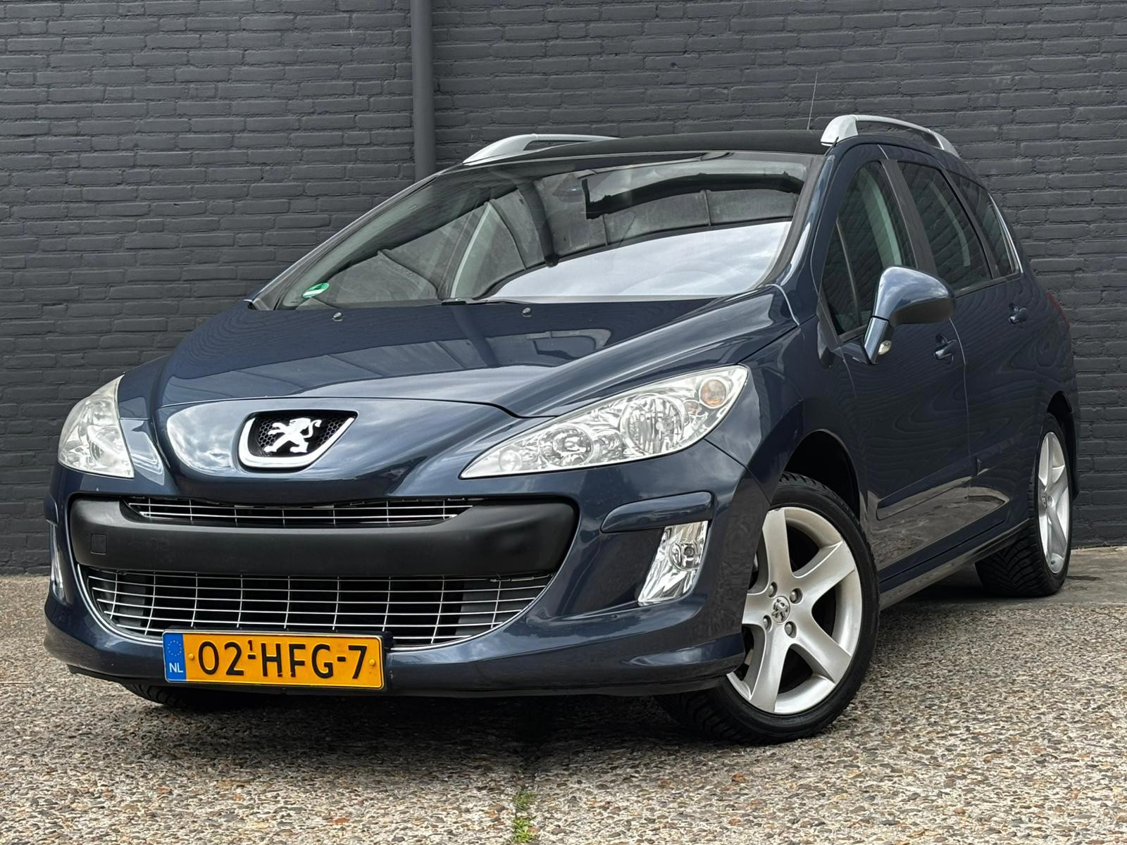 Peugeot 308 1.6 VTi XT TREKHAAK | AIRCO | ELEK RAMEN 2008 - voorkant