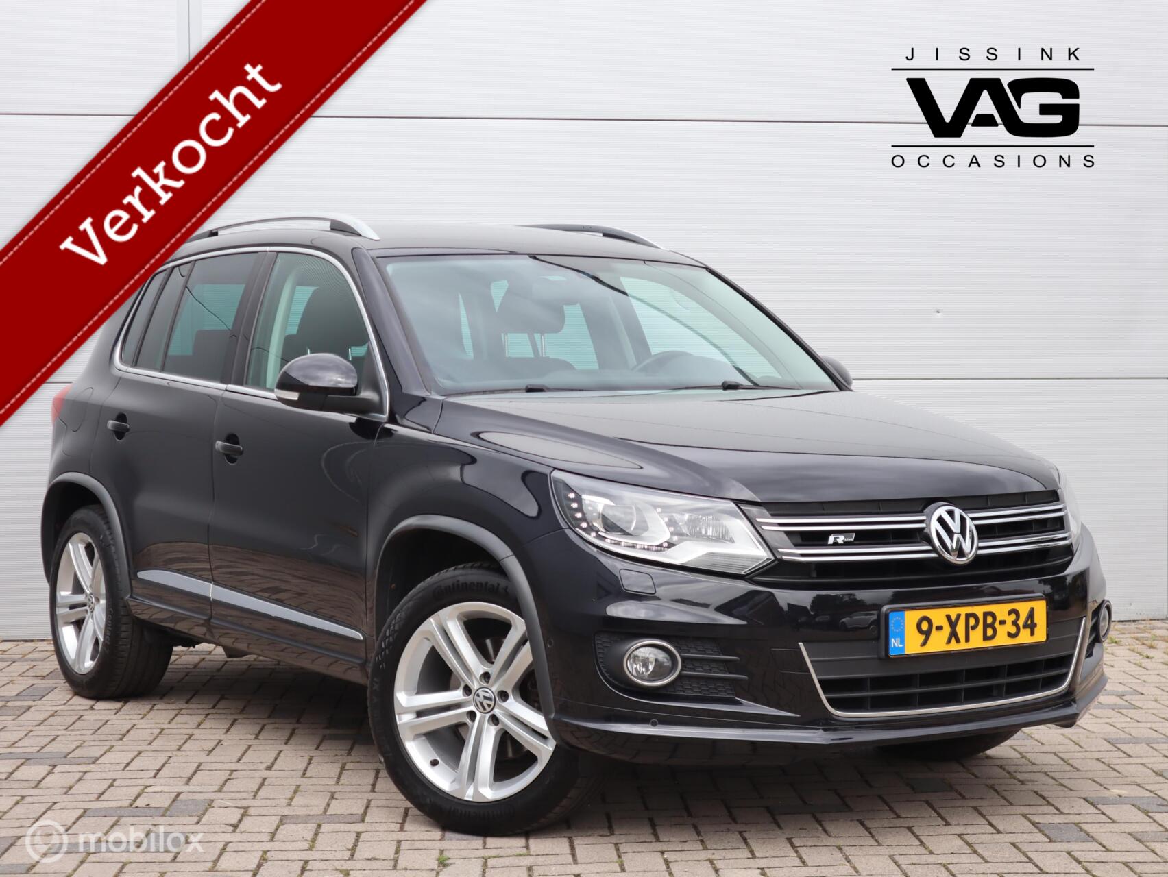 Volkswagen Tiguan 1.4 TSI R-Line LED PDC Alcantara Trekhaak Navi 2014 - voorkant