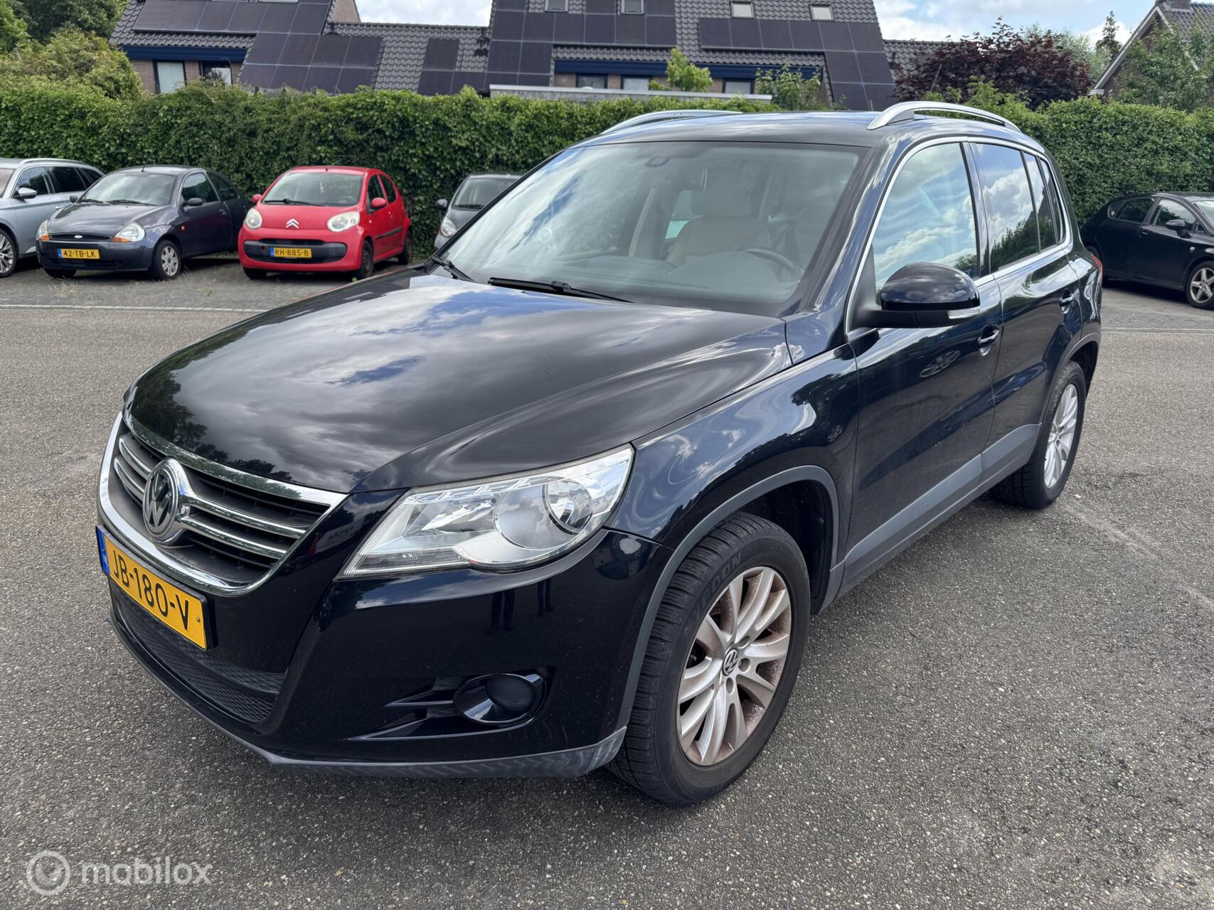 Volkswagen Tiguan 2.0 TSI Sport&Style 4Motion AUT ECC CRUISE LEDER 2009 - voorkant