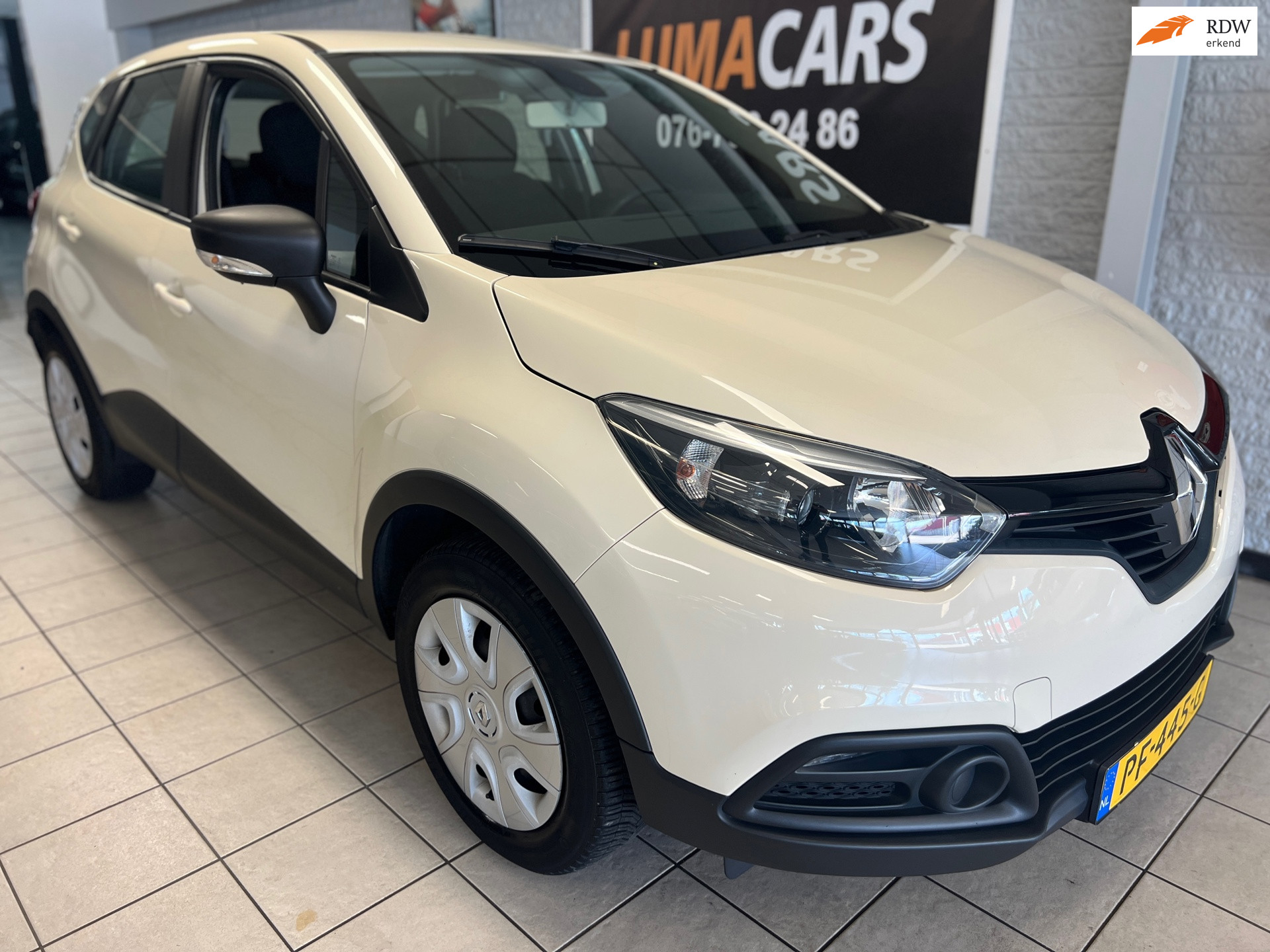 Renault Captur 0.9 TCe Authentique|Airco |Cruise|nieuwe apk 2016 - voorkant