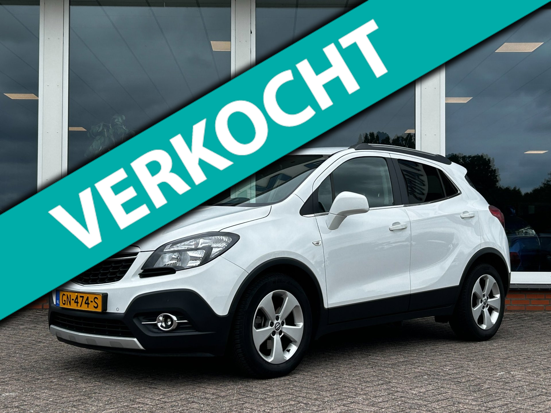 Opel Mokka 1.4 T Cosmo - Origineel NL - NAP - Navi - PDC - Camera - Trekhaak 2015 - voorkant