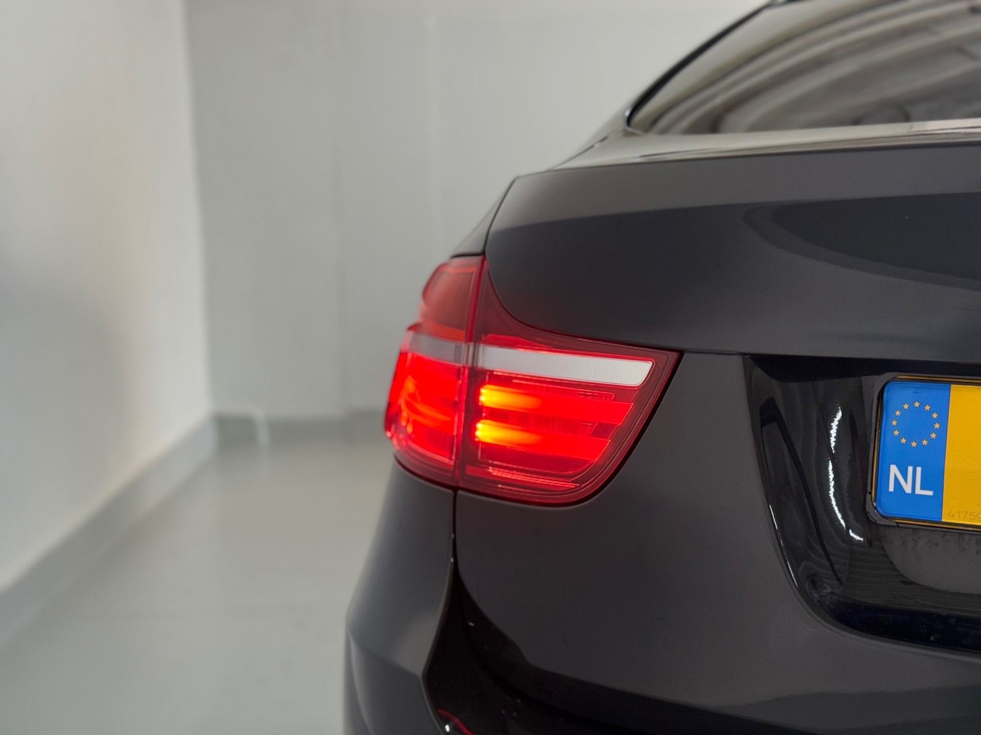 Foto van BMW X6 M50d