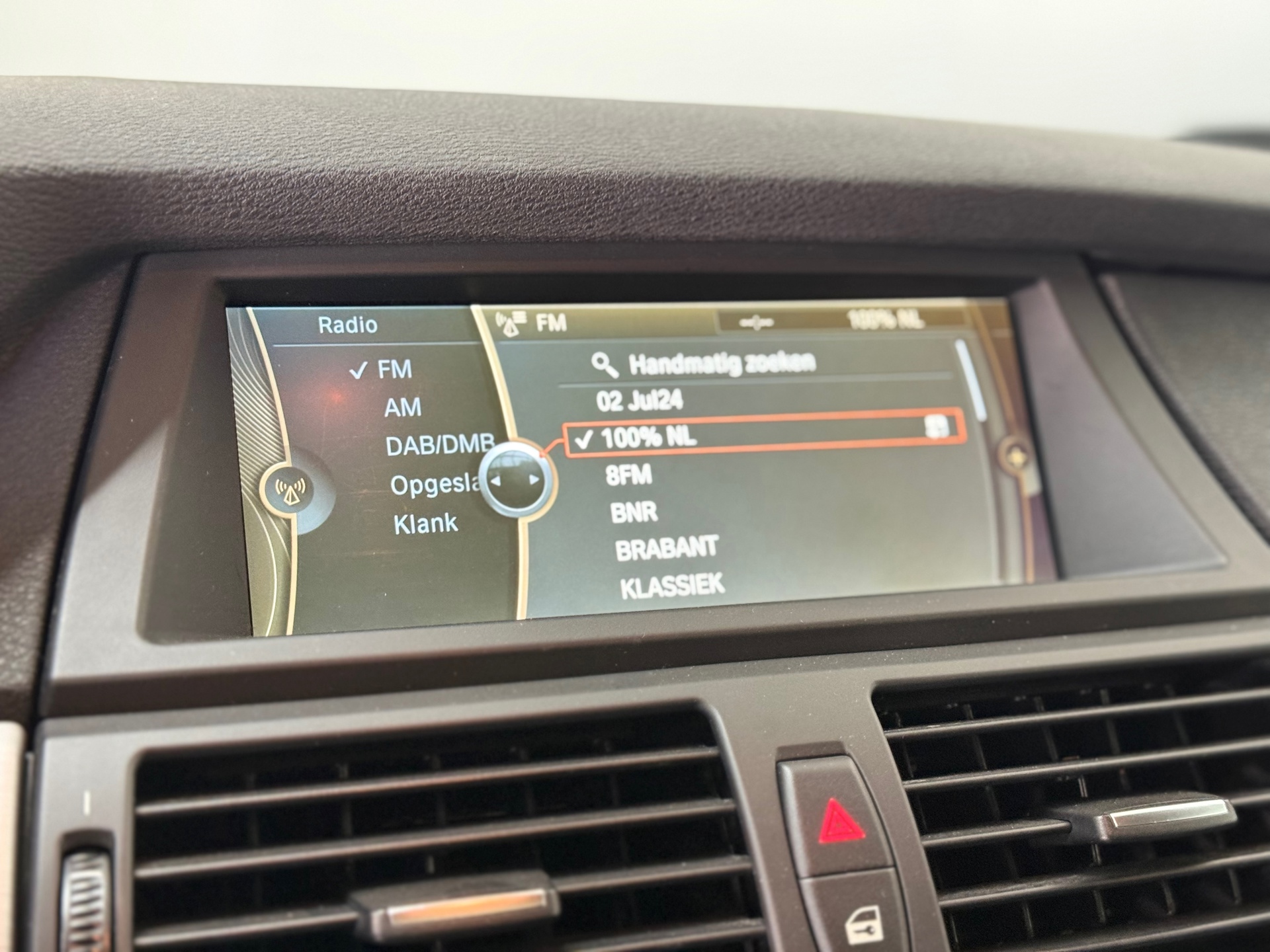 Foto van BMW X6 M50d