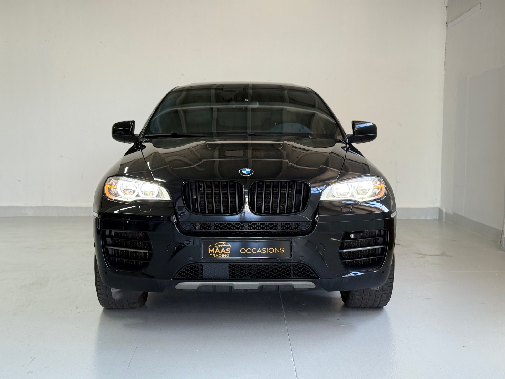 Foto van BMW X6 M50d