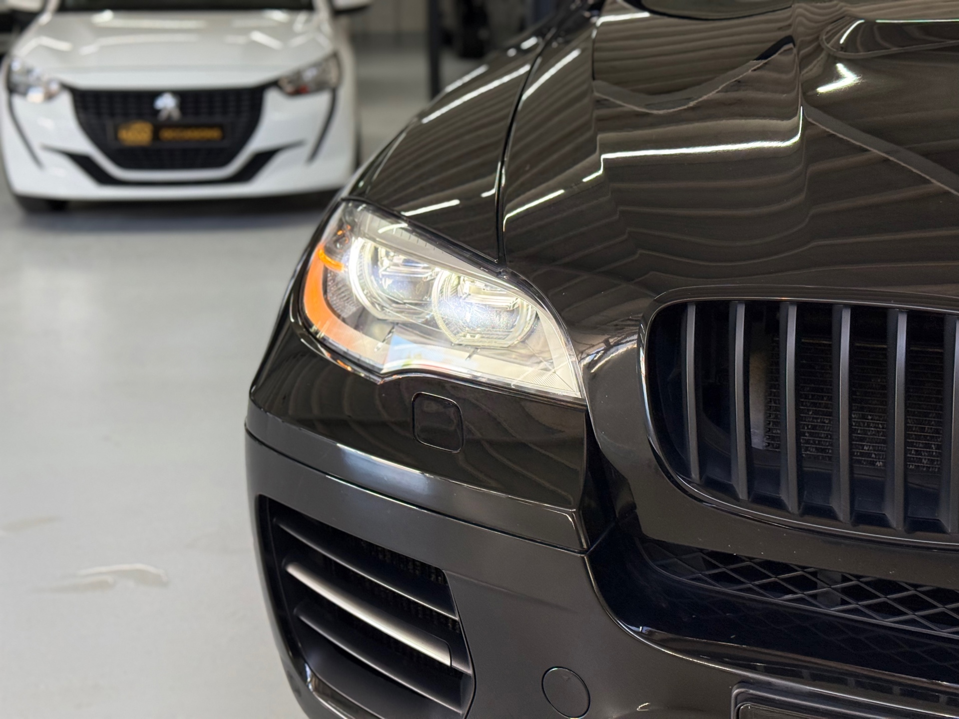 Foto van BMW X6 M50d