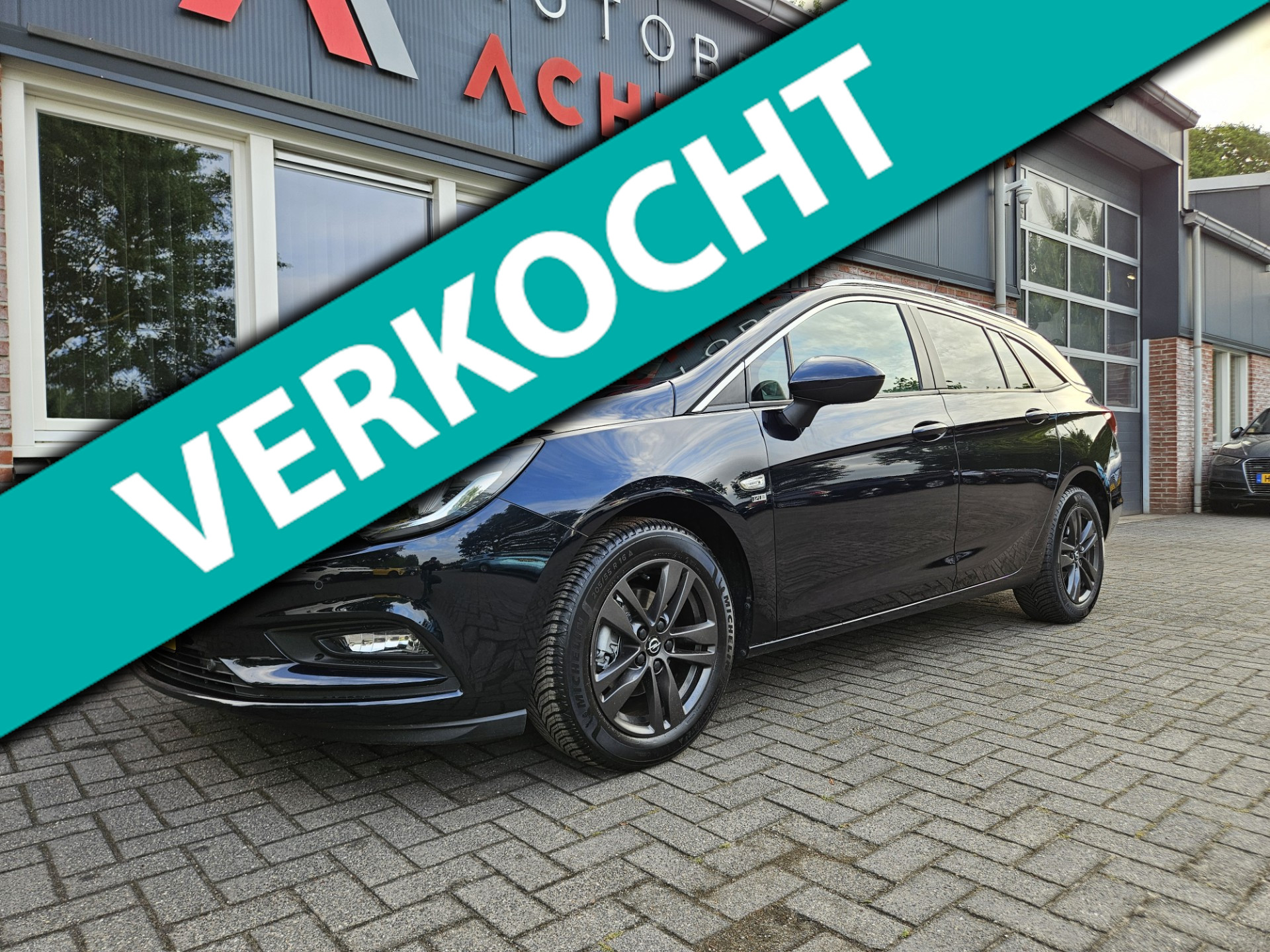 Opel Astra Sports Tourer 1.0 Turbo 120 Jaar Edition Trekhaak! Navigatie! PDC! Dealer Onderhouden! NAP! Nette Auto! 2019 - voorkant