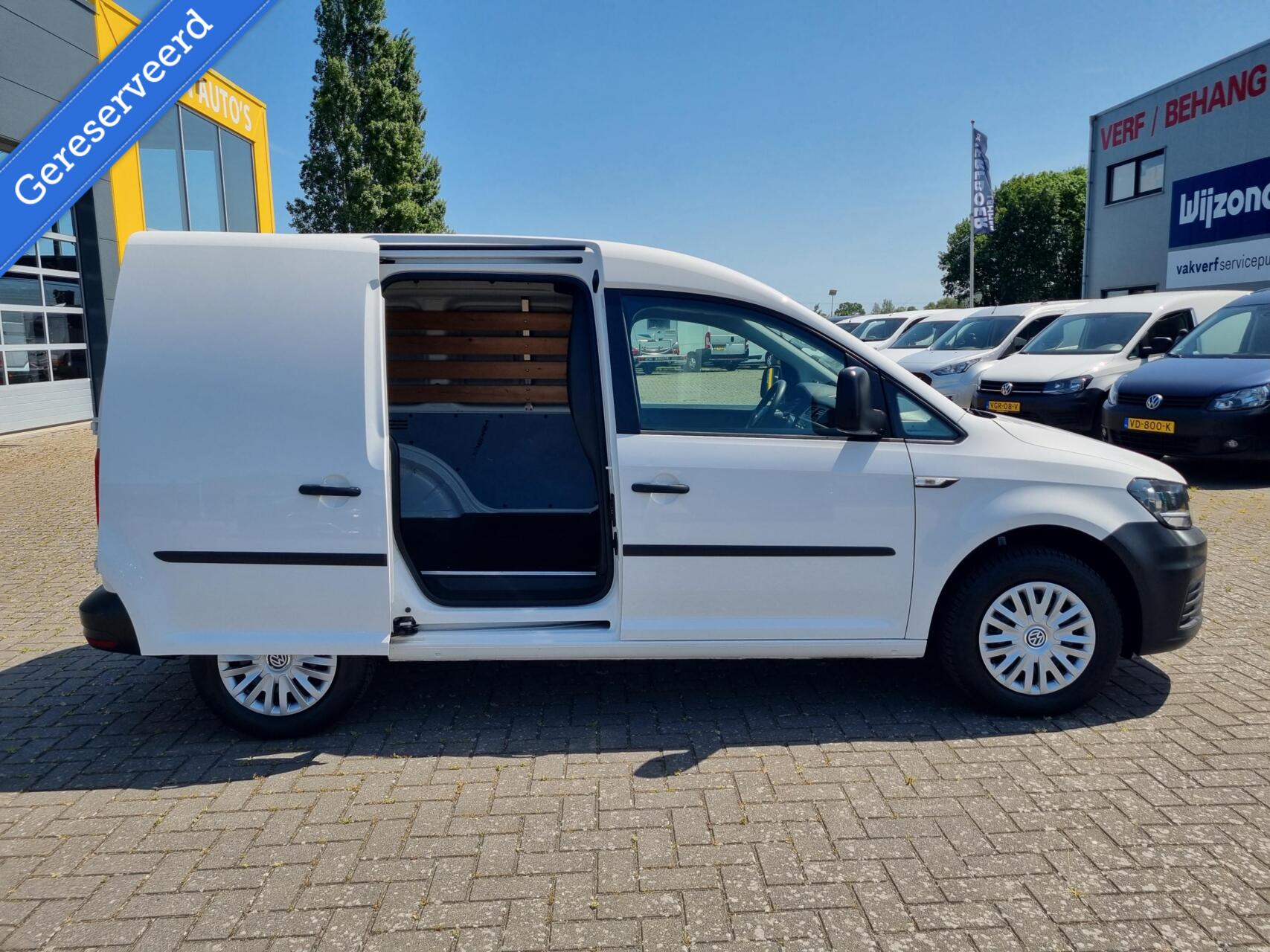 Foto van Volkswagen Caddy Modified Partition Wall