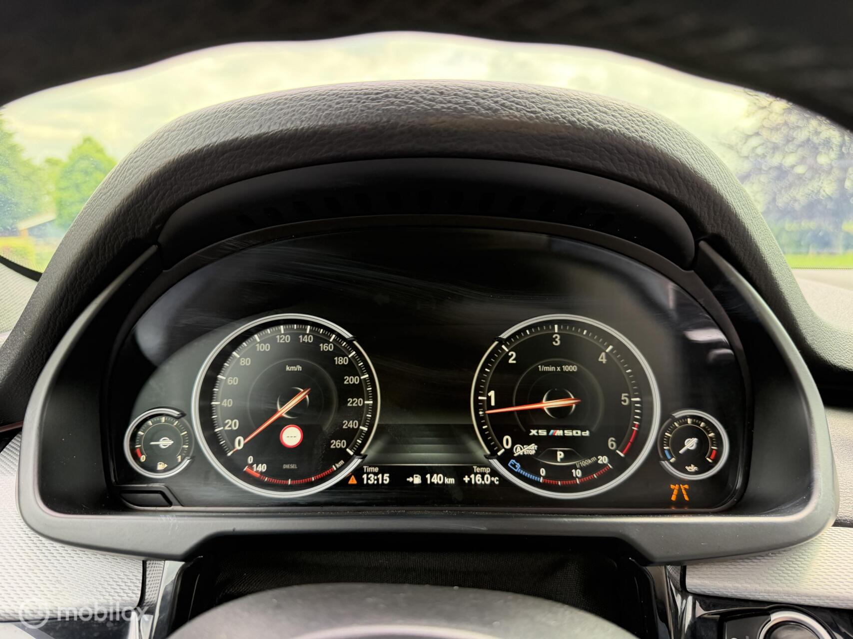 Foto van BMW X5 M50d