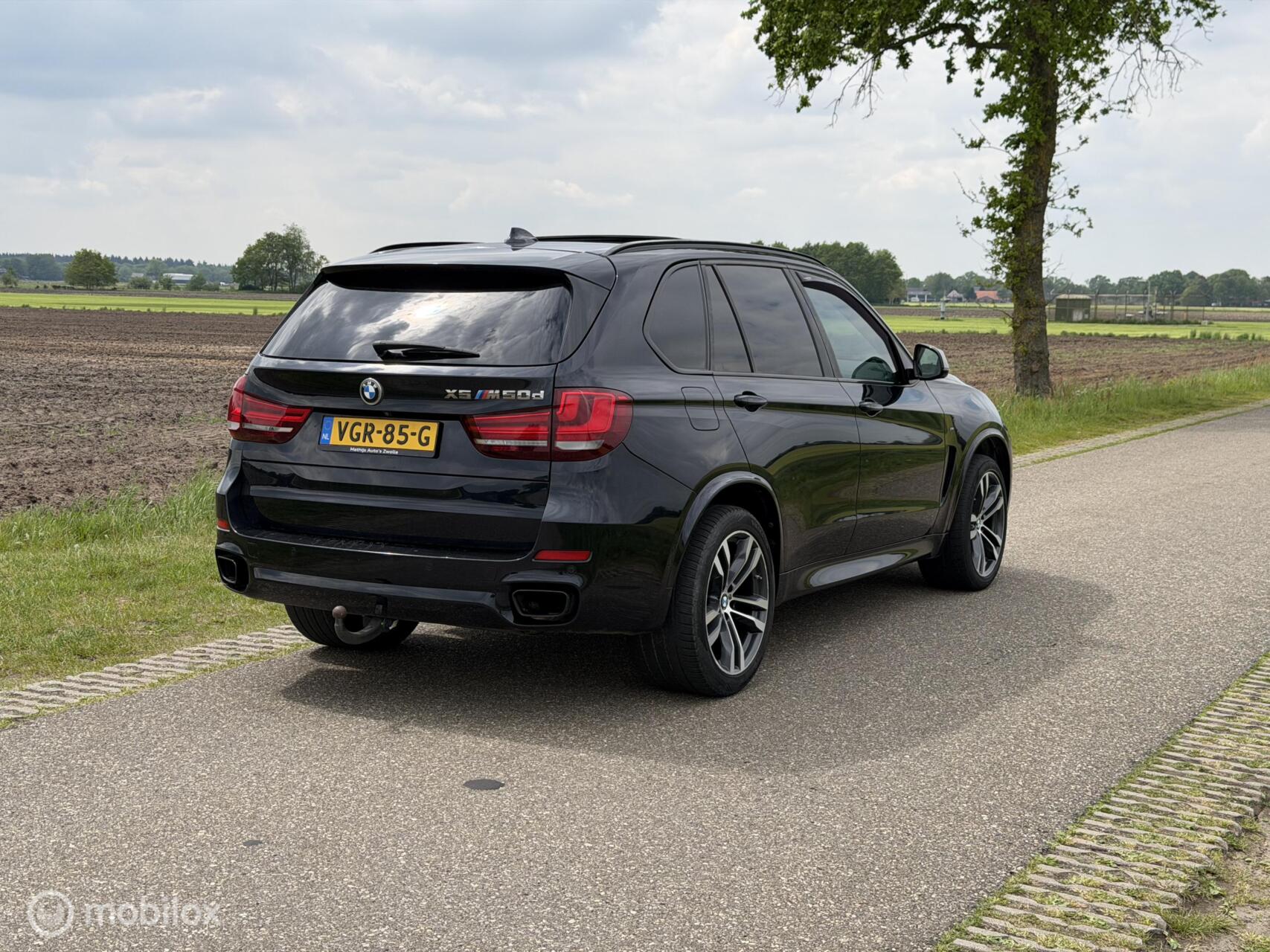 Foto van BMW X5 M50d