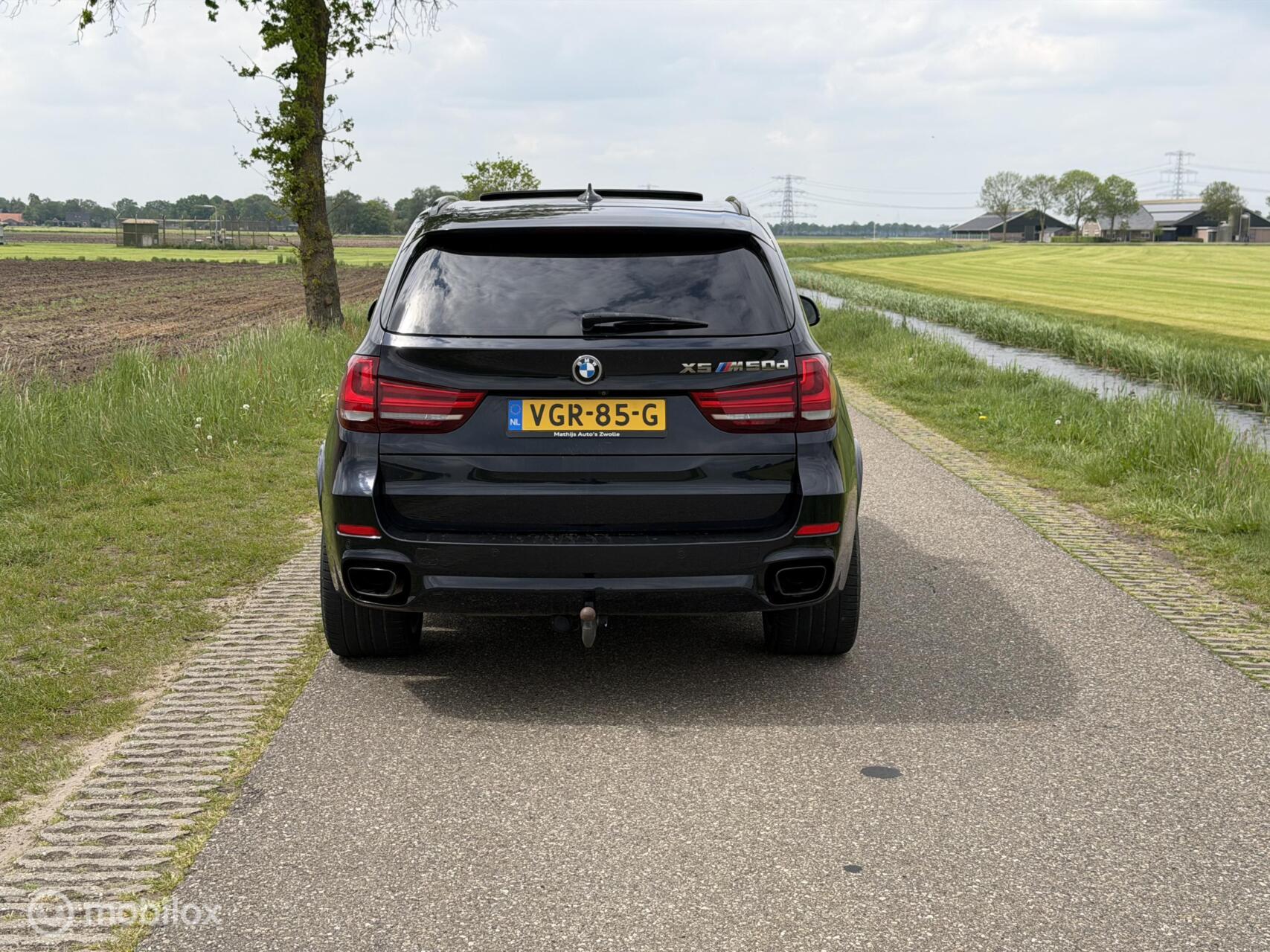 Foto van BMW X5 M50d