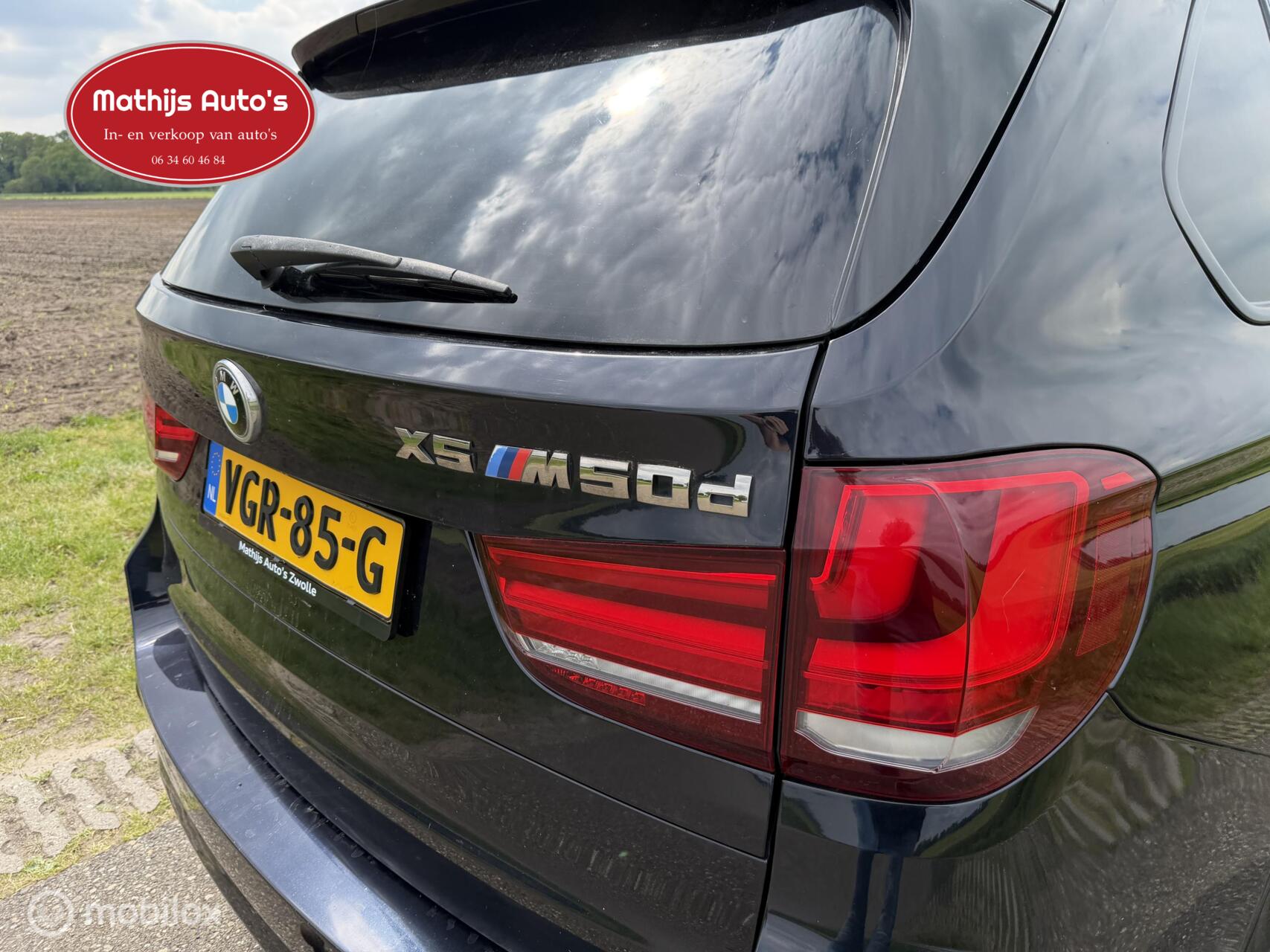 Foto van BMW X5 M50d