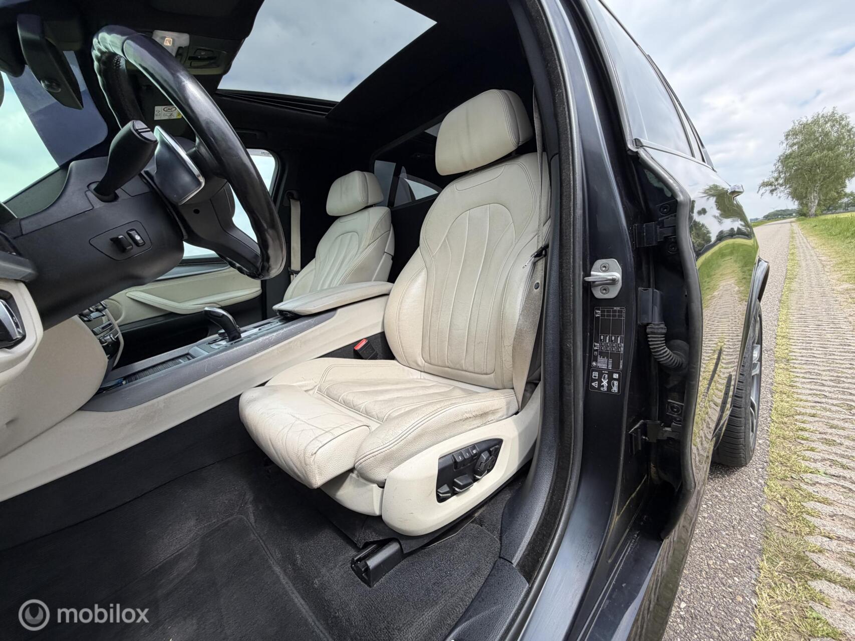 Foto van BMW X5 M50d