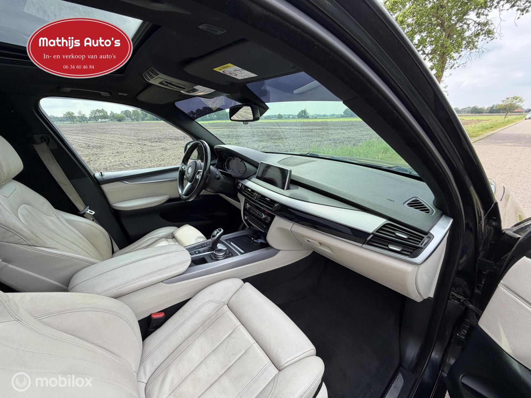 Foto van BMW X5 M50d