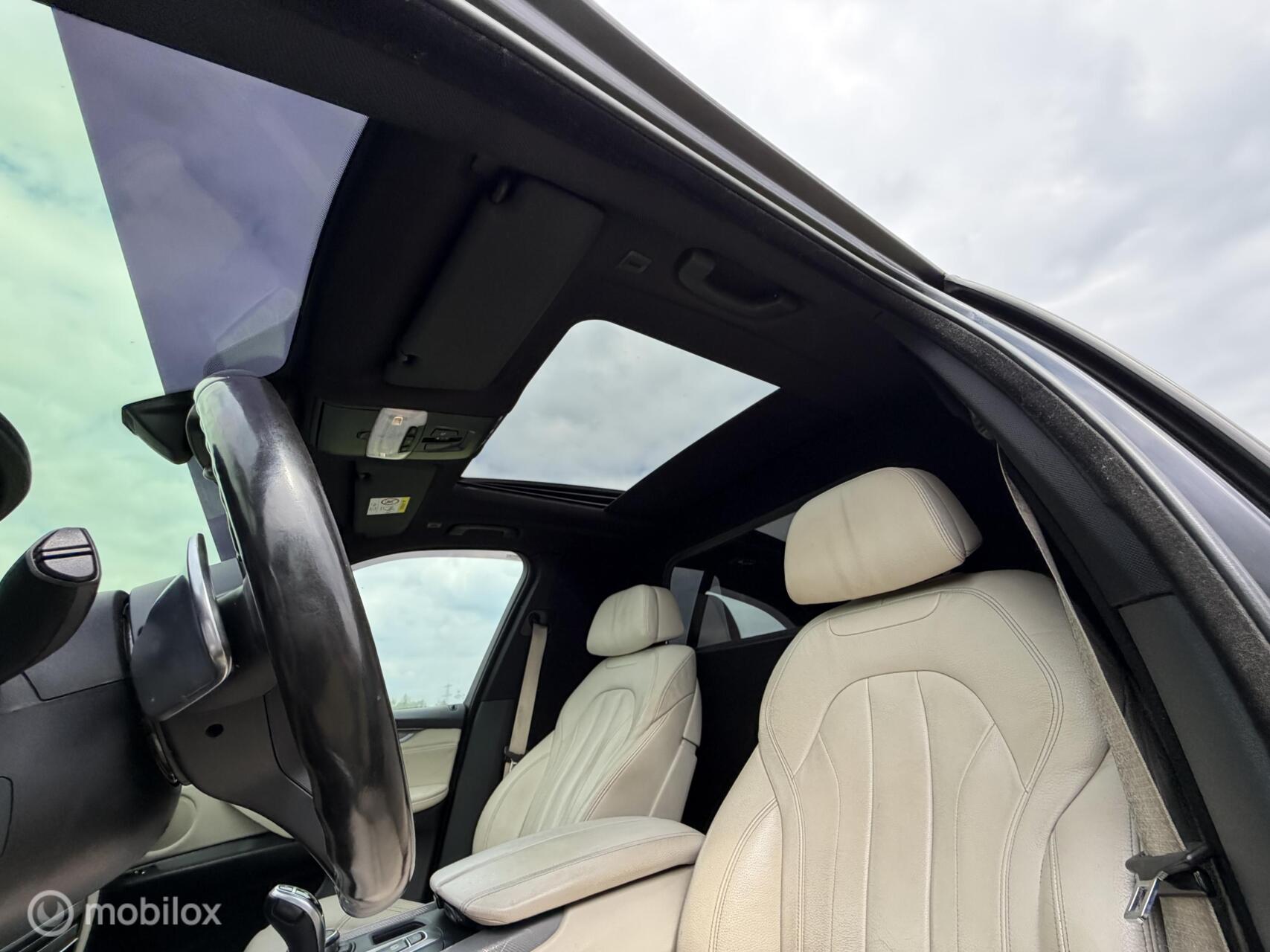 Foto van BMW X5 M50d