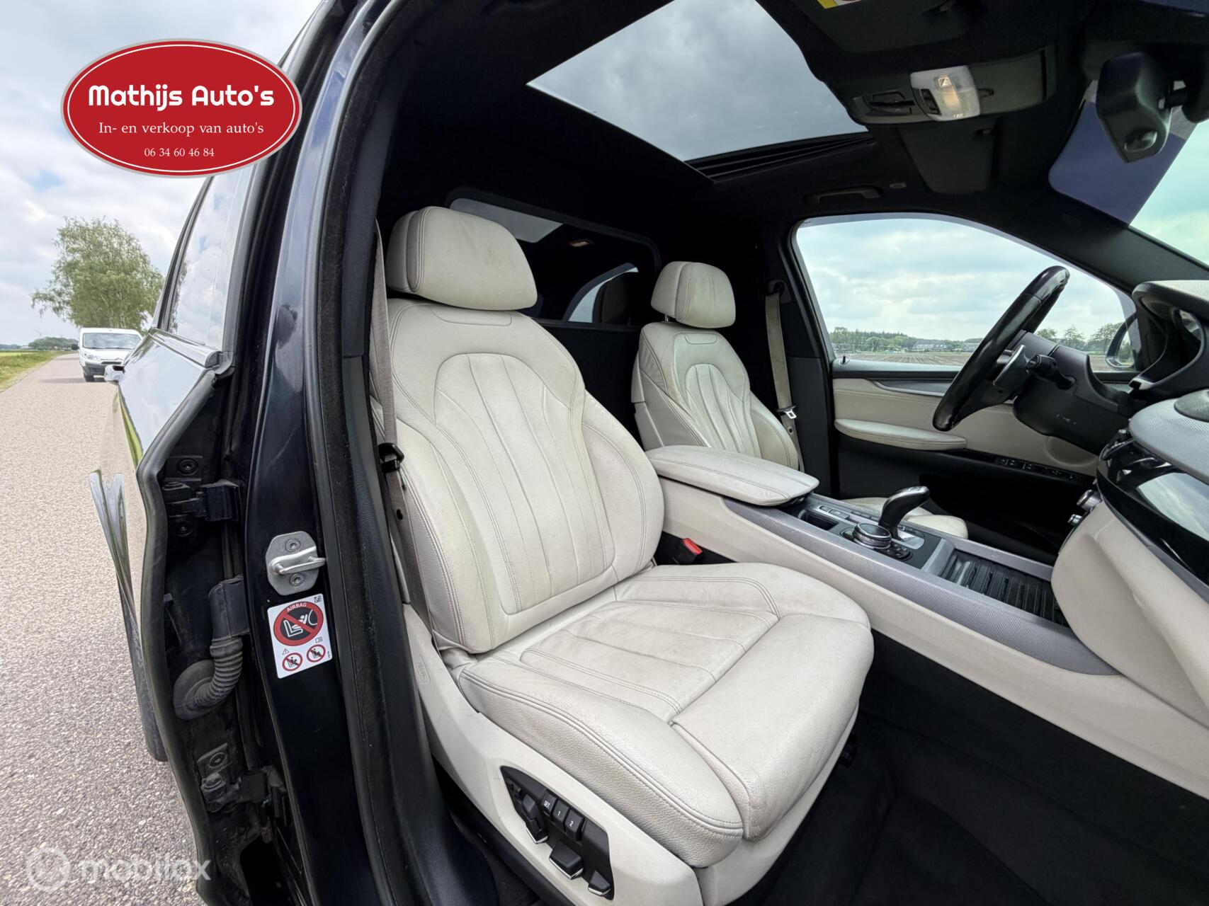 Foto van BMW X5 M50d
