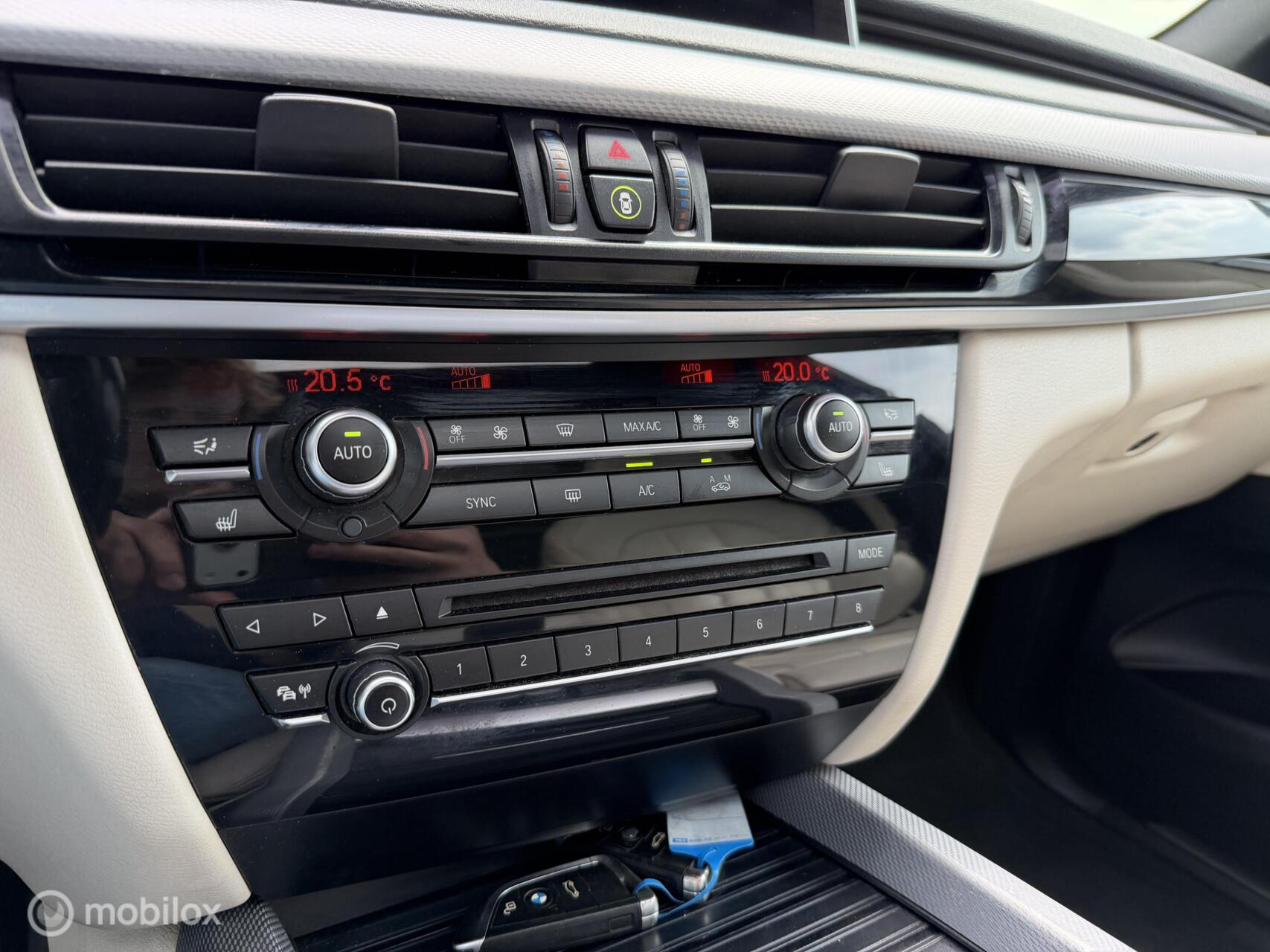 Foto van BMW X5 M50d