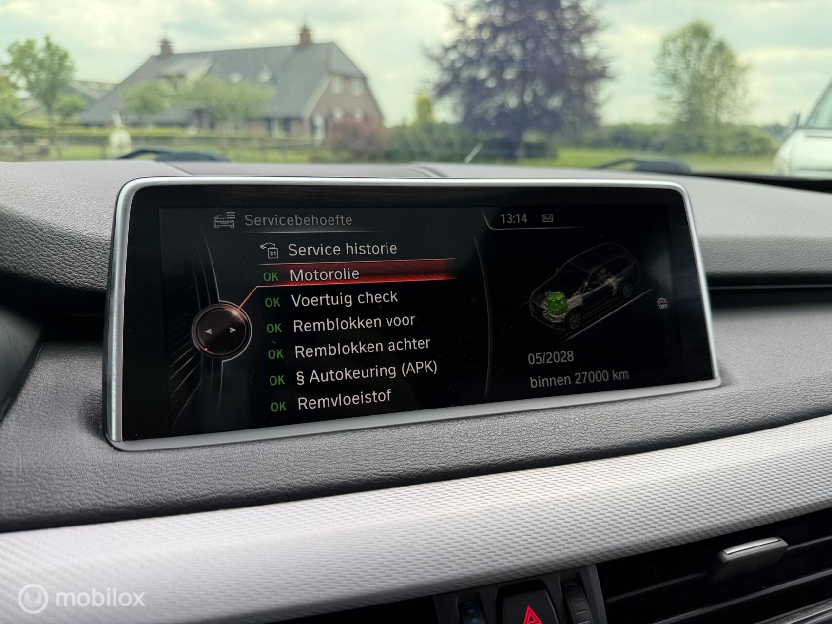 Foto van BMW X5 M50d