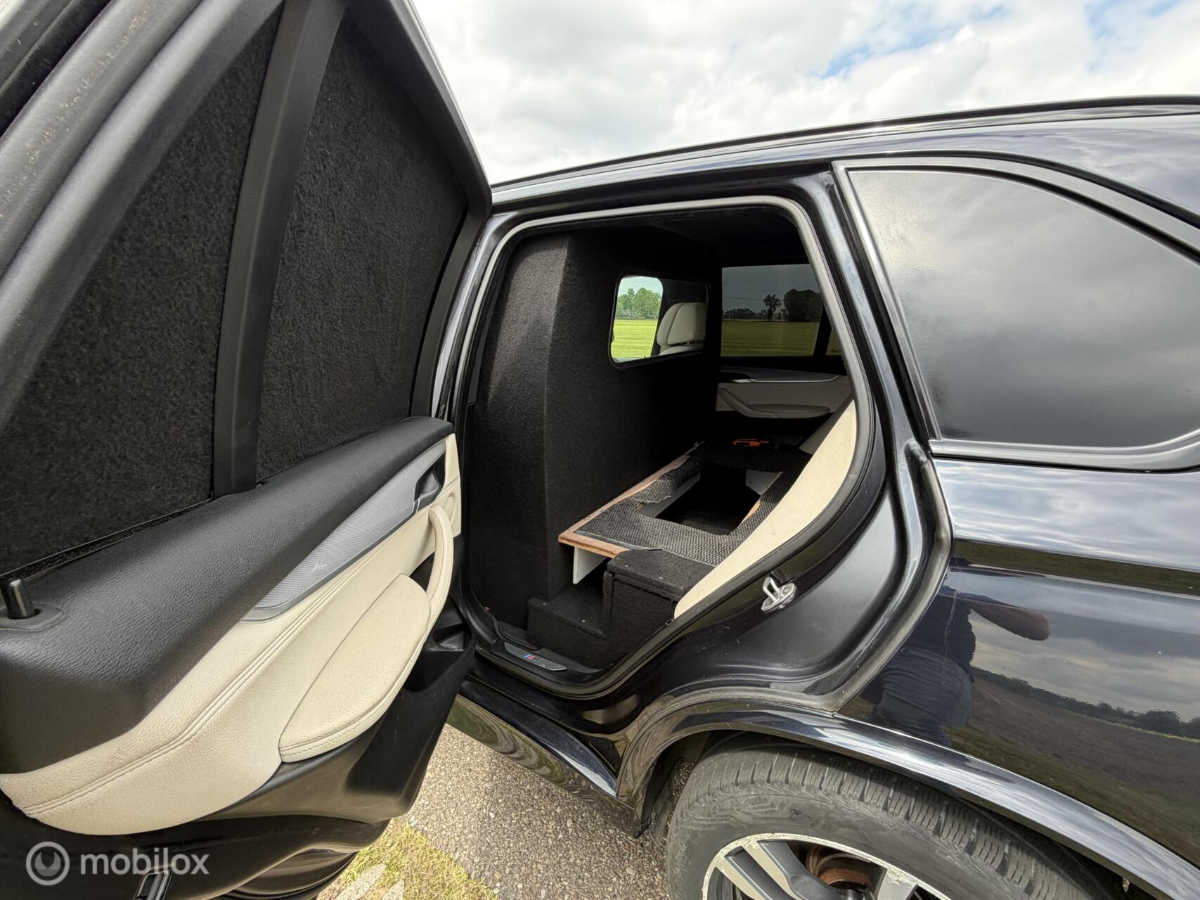 Foto van BMW X5 M50d