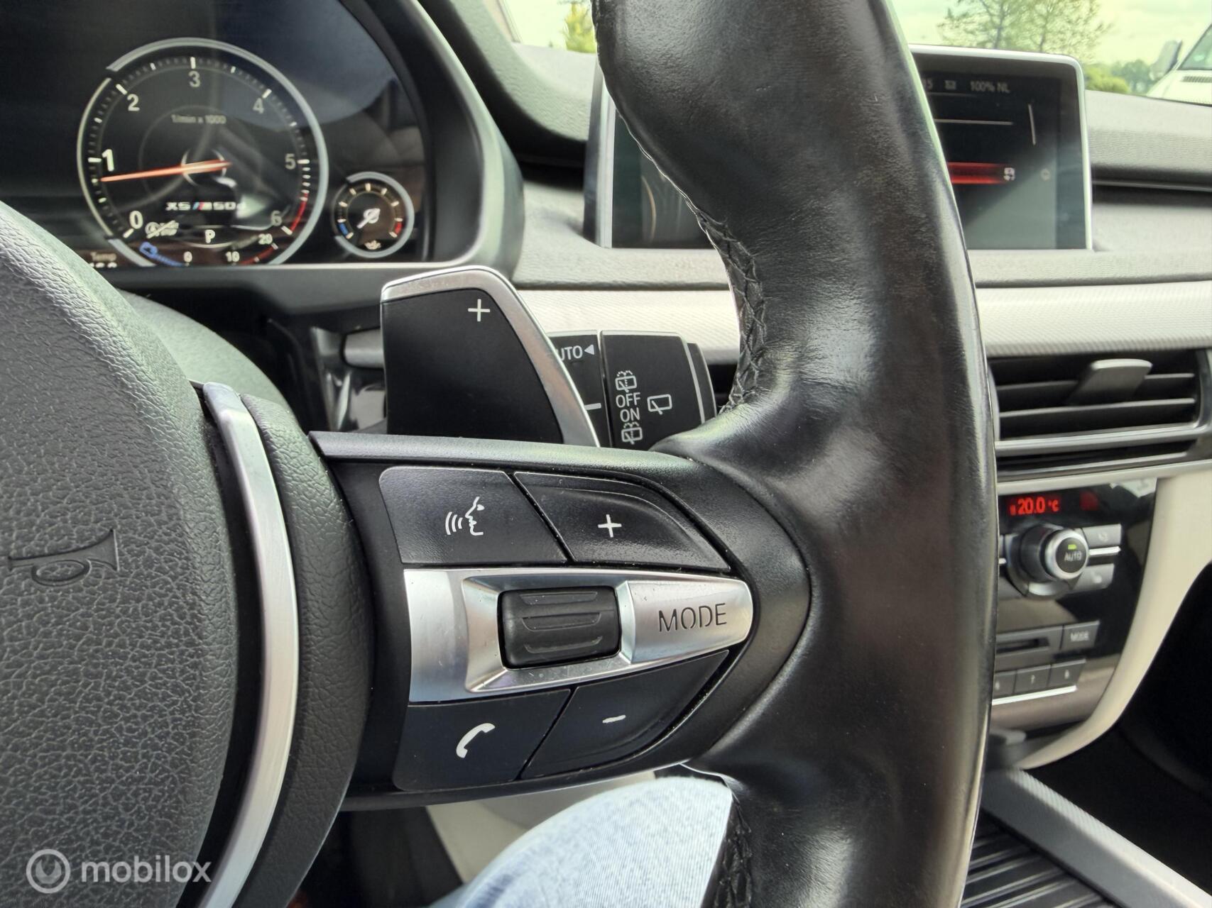 Foto van BMW X5 M50d