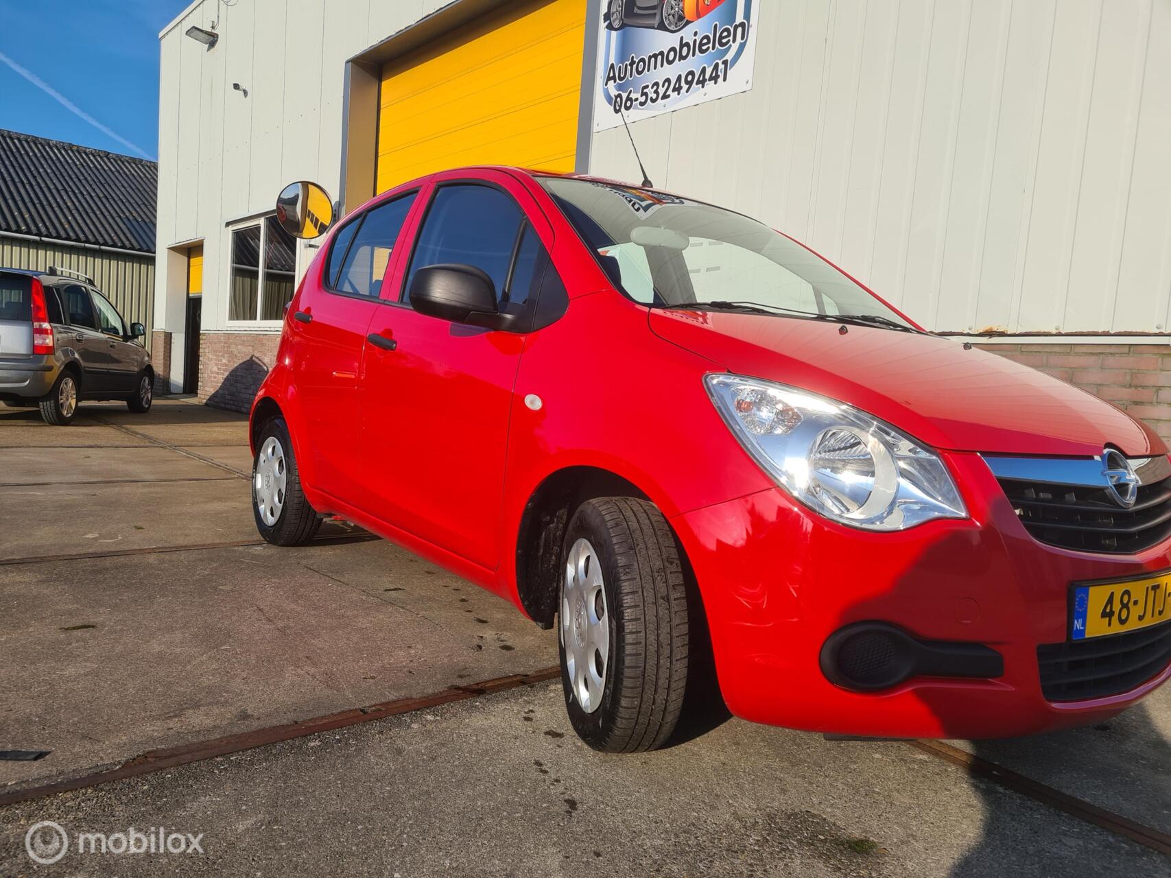 Opel Agila 1.0 Essentia BJ 2009  65033 km org nap 2009 - voorkant