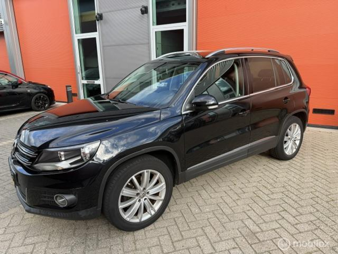 Volkswagen Tiguan 2.0 TSI Sport&Style 4motion R-line Editio 2013 - voorkant