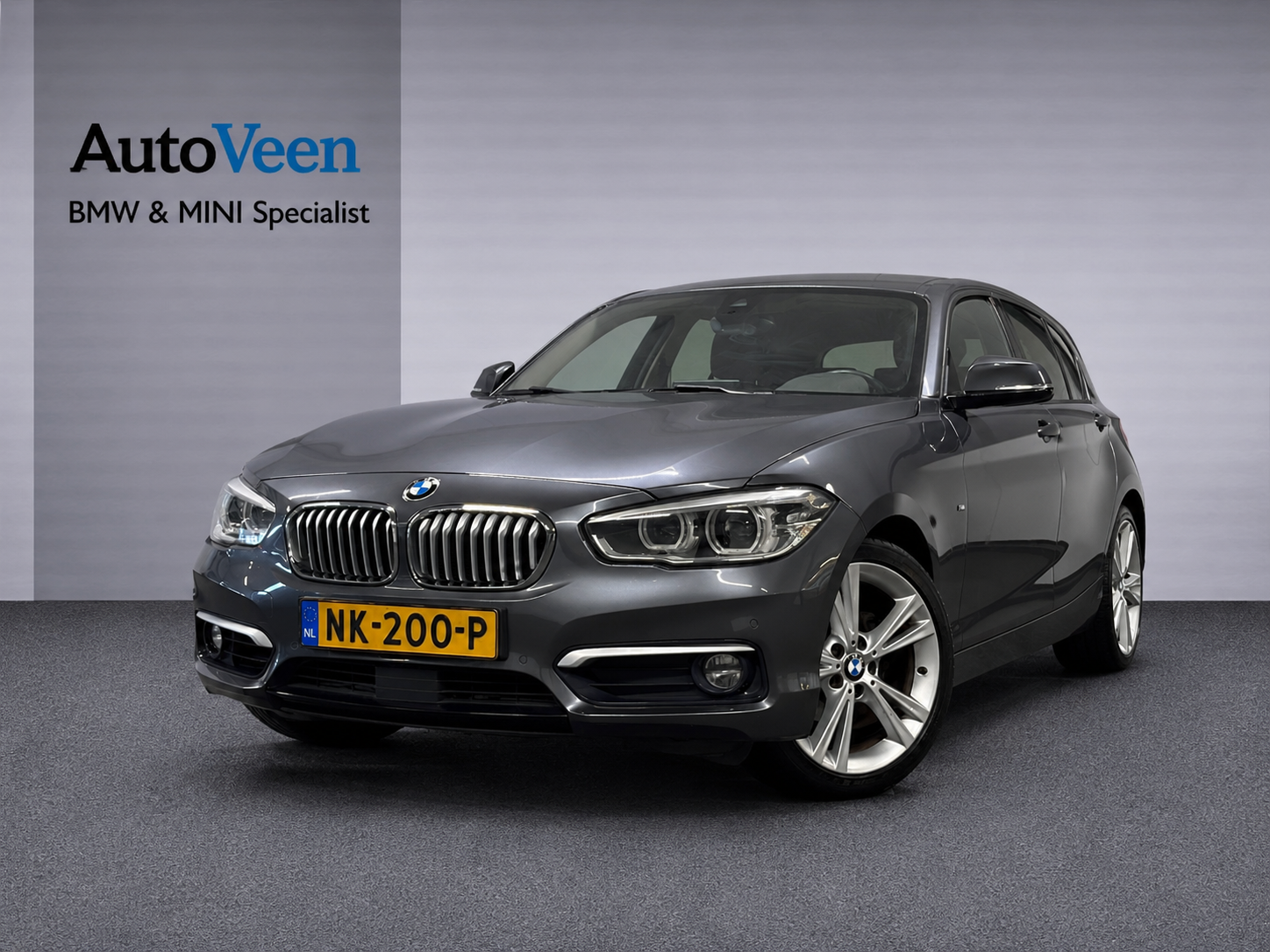 BMW 118i 118i Centennial High Executive (M-SPORT, LED, LEDER, NAVI, STOELVERWARMING) 2017 - voorkant