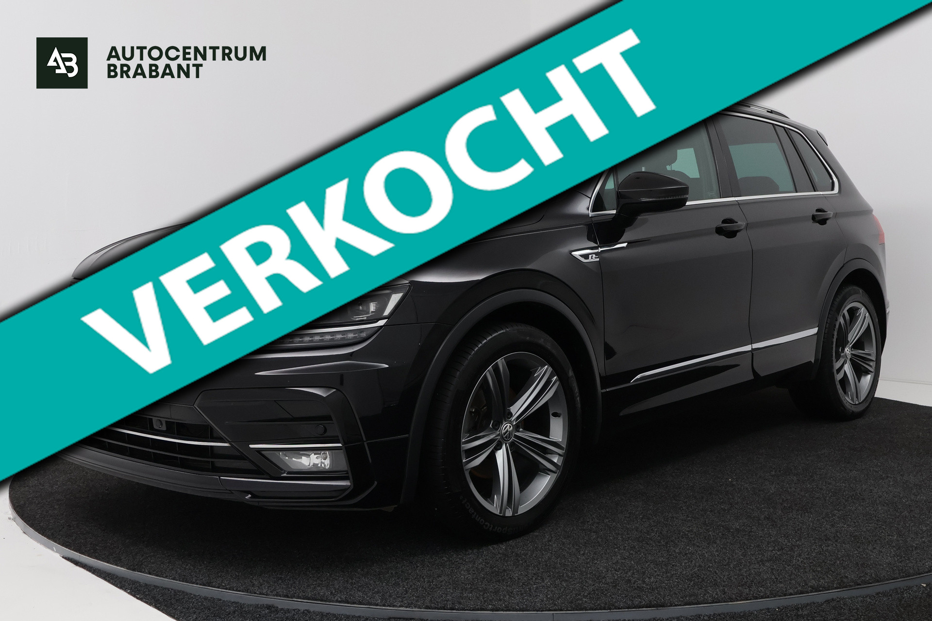 Volkswagen Tiguan 1.4 TSI Highline Business R (PANORAMADAK, TREKHAAK, DIGITALE COCKPIT, STOELVERWARMING, CRUISE ADAPTIEF) 2018 - voorkant