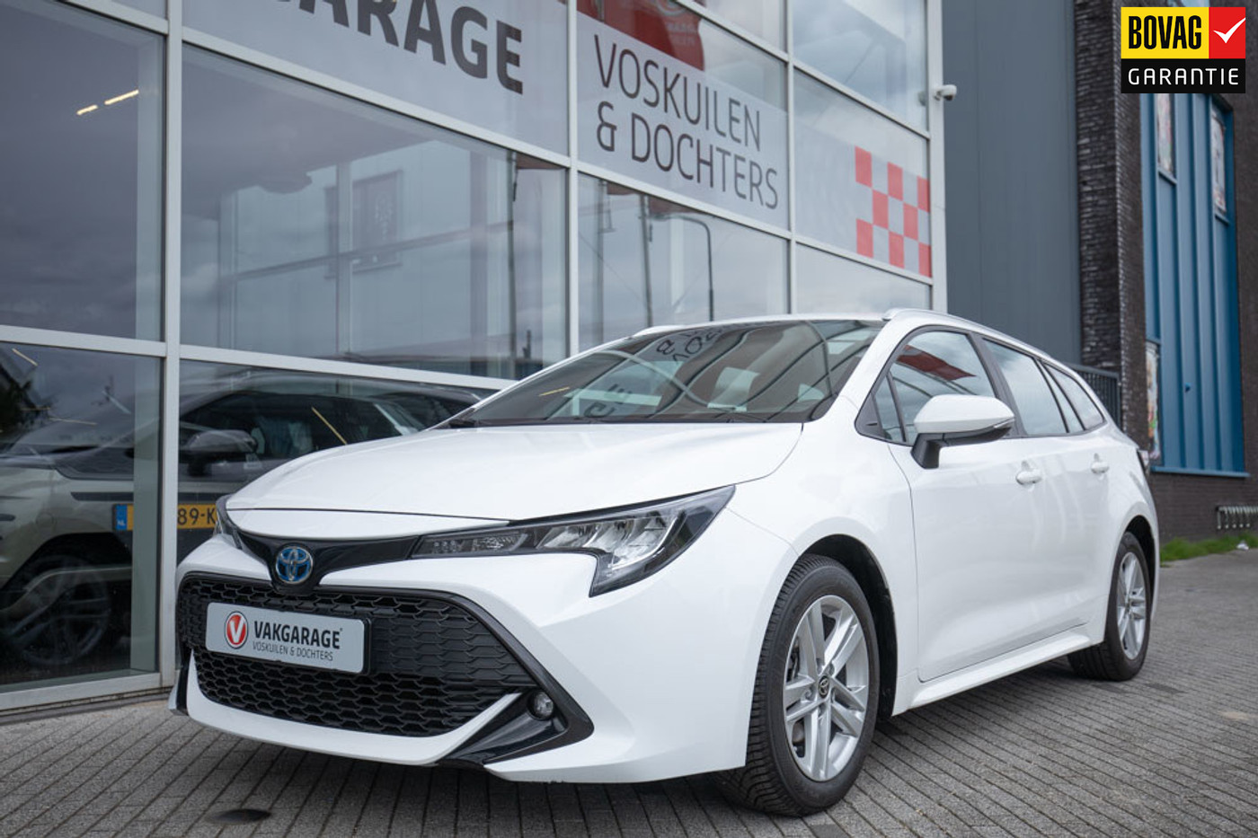 Toyota Corolla Touring Sports 1.8 Hybrid Business | Stoelverwarming 2022 - voorkant