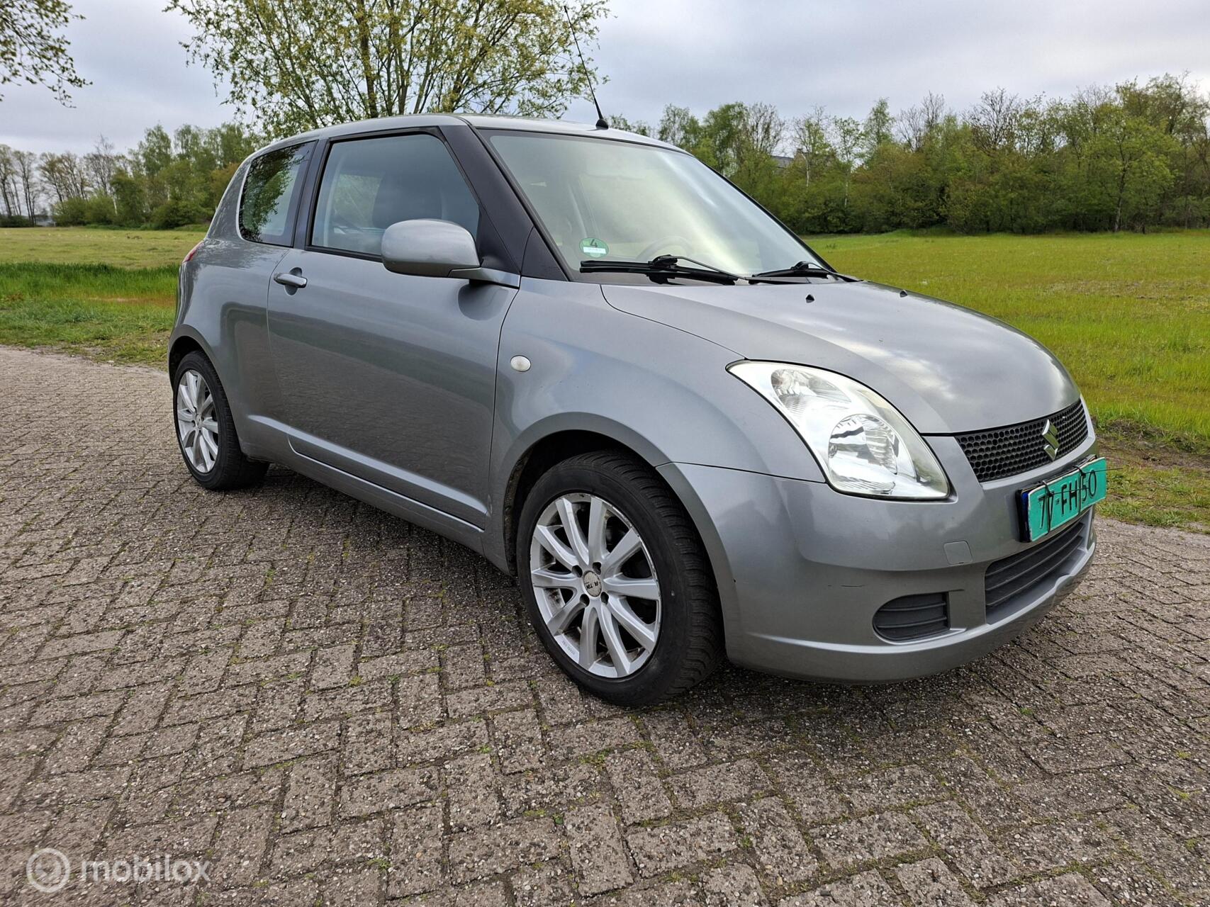 Suzuki Swift 1.3 GA 2007 nieuwe apk rijd schakelt goed 2007 - voorkant