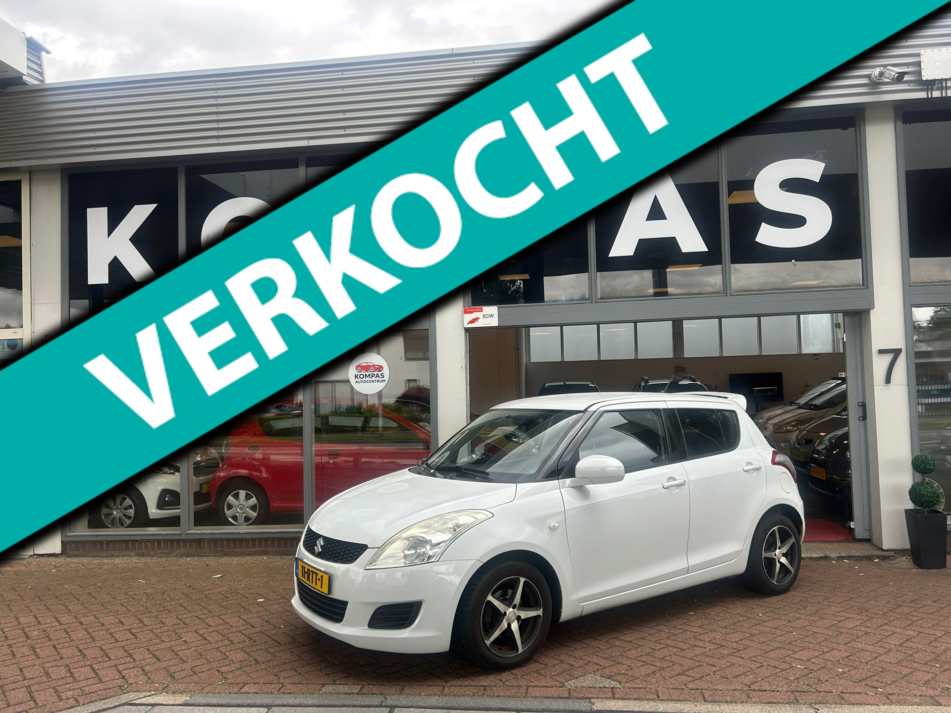 Suzuki Swift 1.2 Comfort EASSS |STOELVERW.|AIRCO|5DEURS|NAP|LM.VELGEN|MULTIF.STUUR|SPOILER|USB|EL.RAMEN 2011 - voorkant