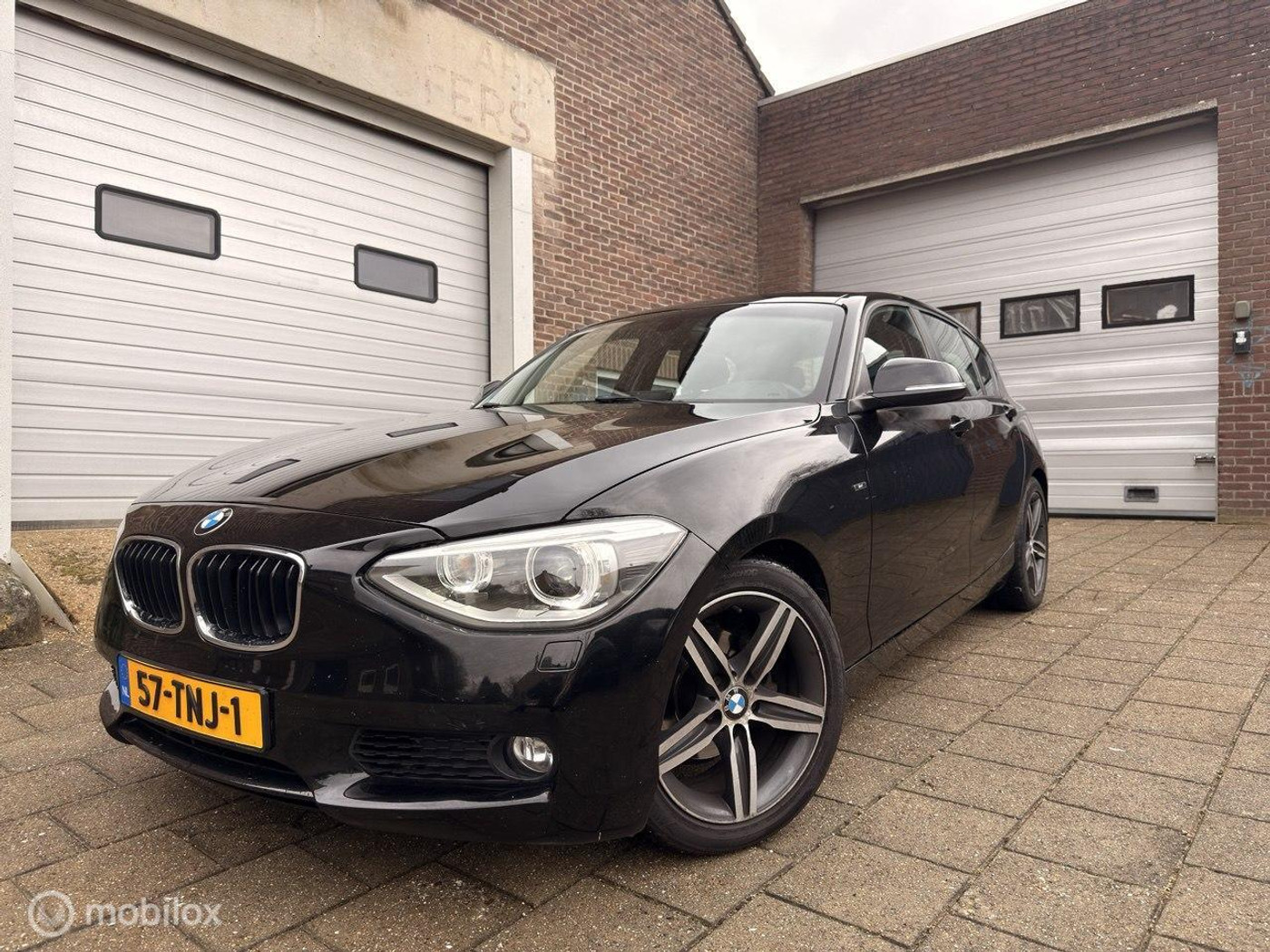 BMW 1er Reihe 116i Business 2012 - voorkant
