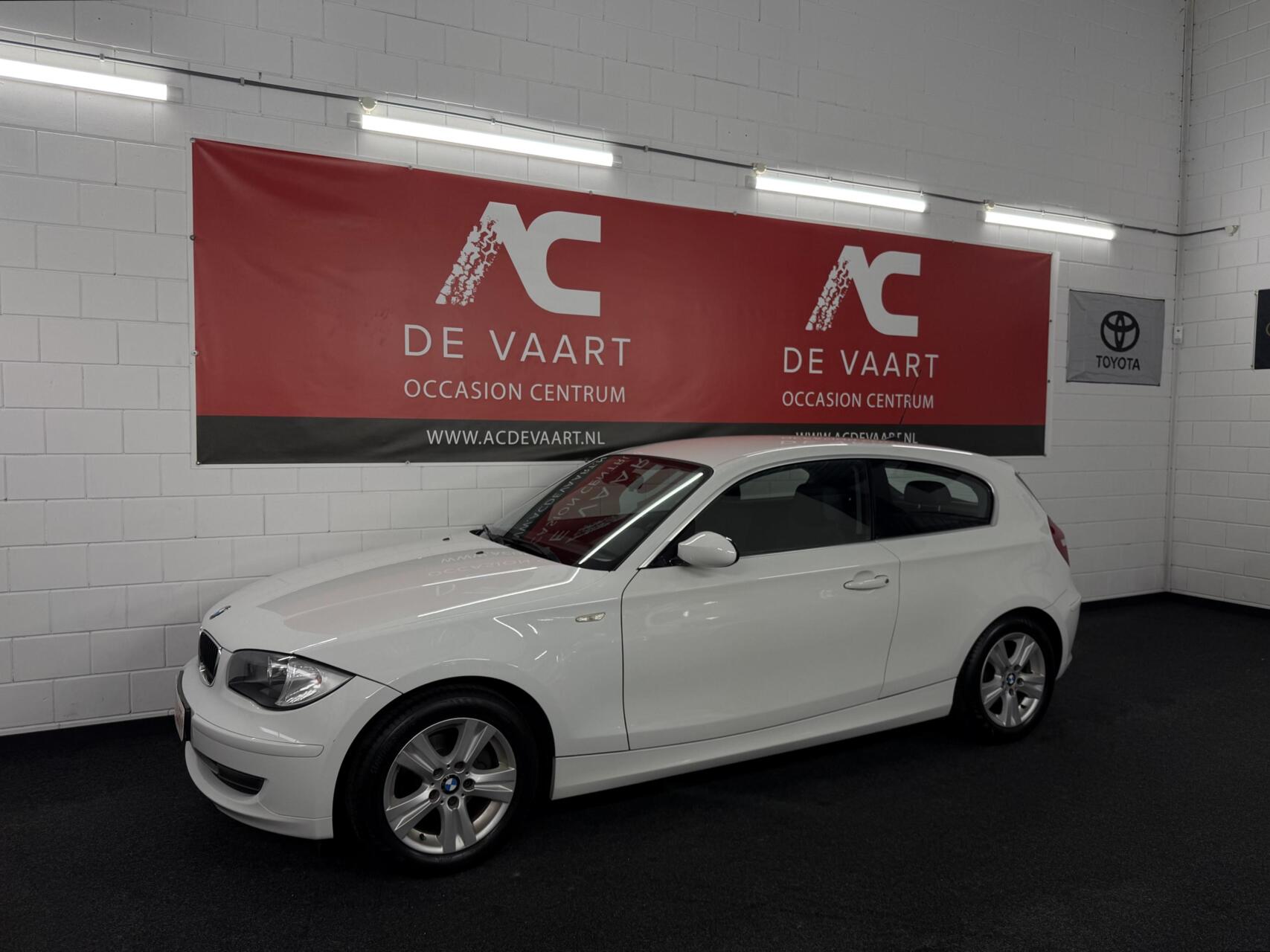 BMW 1er Reihe 116i Business Line - VERKOCHT! 2009 - voorkant