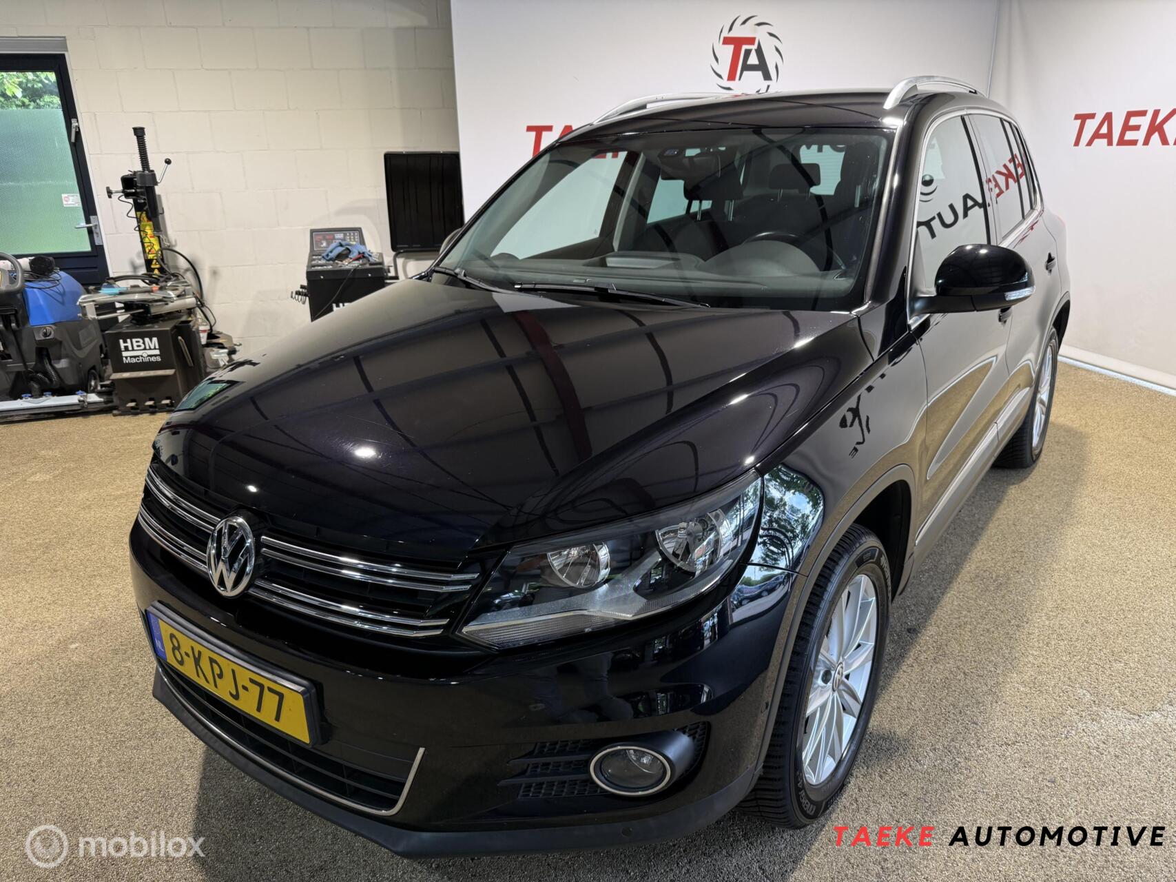 Volkswagen Tiguan 1.4 TSI Sport&Style CLIMA/CRUISE/PDC/NAP 2013 - voorkant