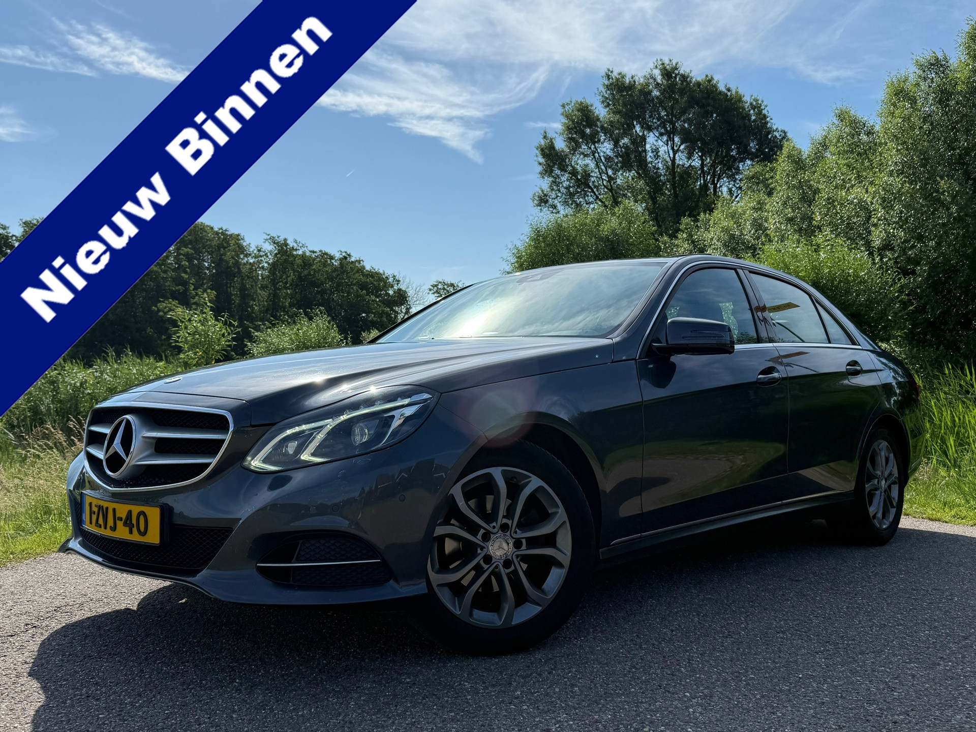 Mercedes-Benz E 220 CDI 220 CDI Prestige Avantgarde Automaat / Schuif-Kanteldak / Leder / Navi / Clima / Trekhaak / Stoelverwarming 2014 - voorkant