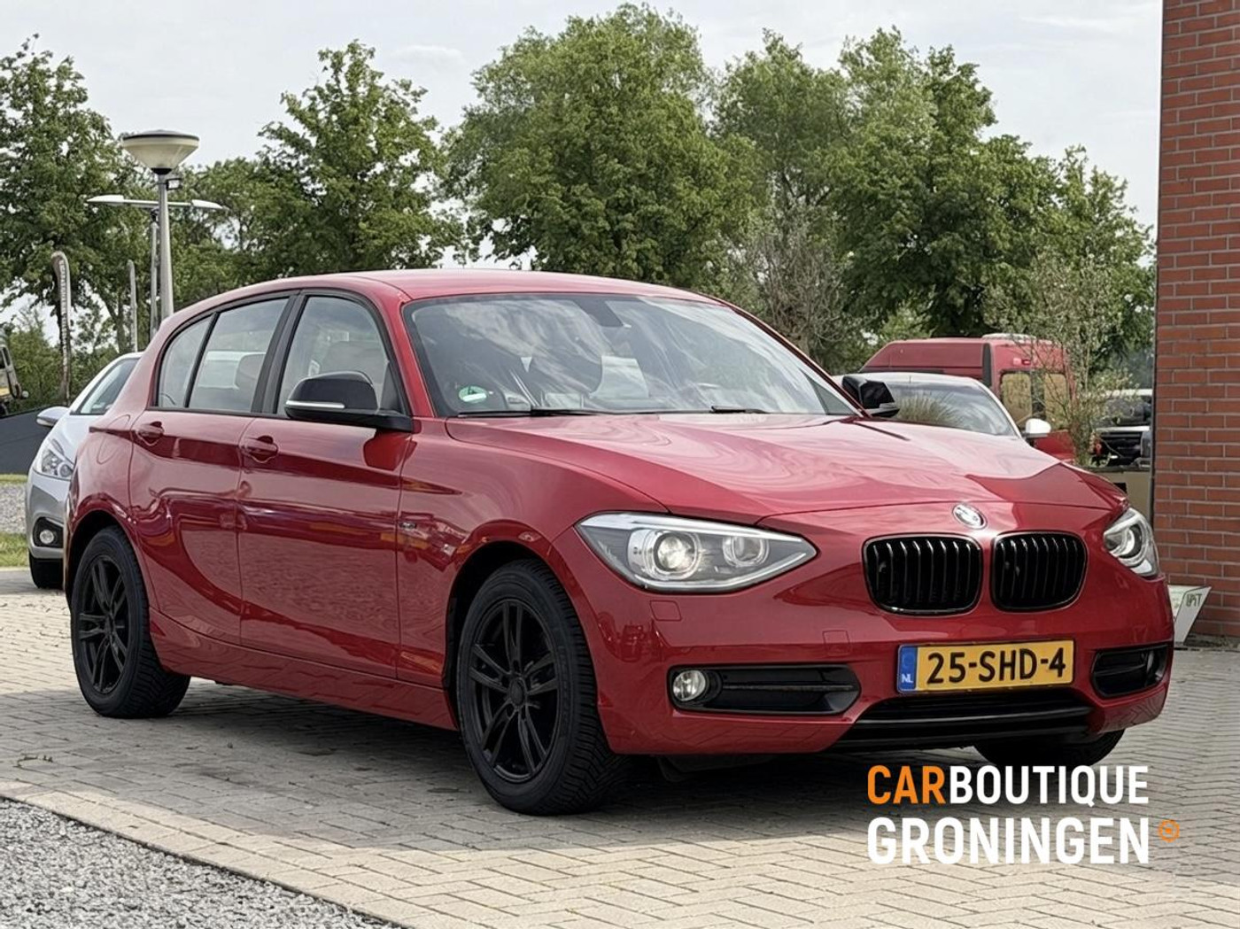 BMW 1er Reihe 116i Business Sport | NIEUWE APK | ORI NL | NAP 2011 - voorkant