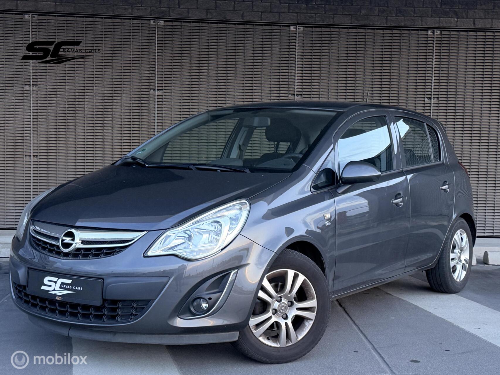 Opel Corsa 1.2 Anniversay Edition Cruise|1/2Leer|Airco|NAP 2012 - voorkant