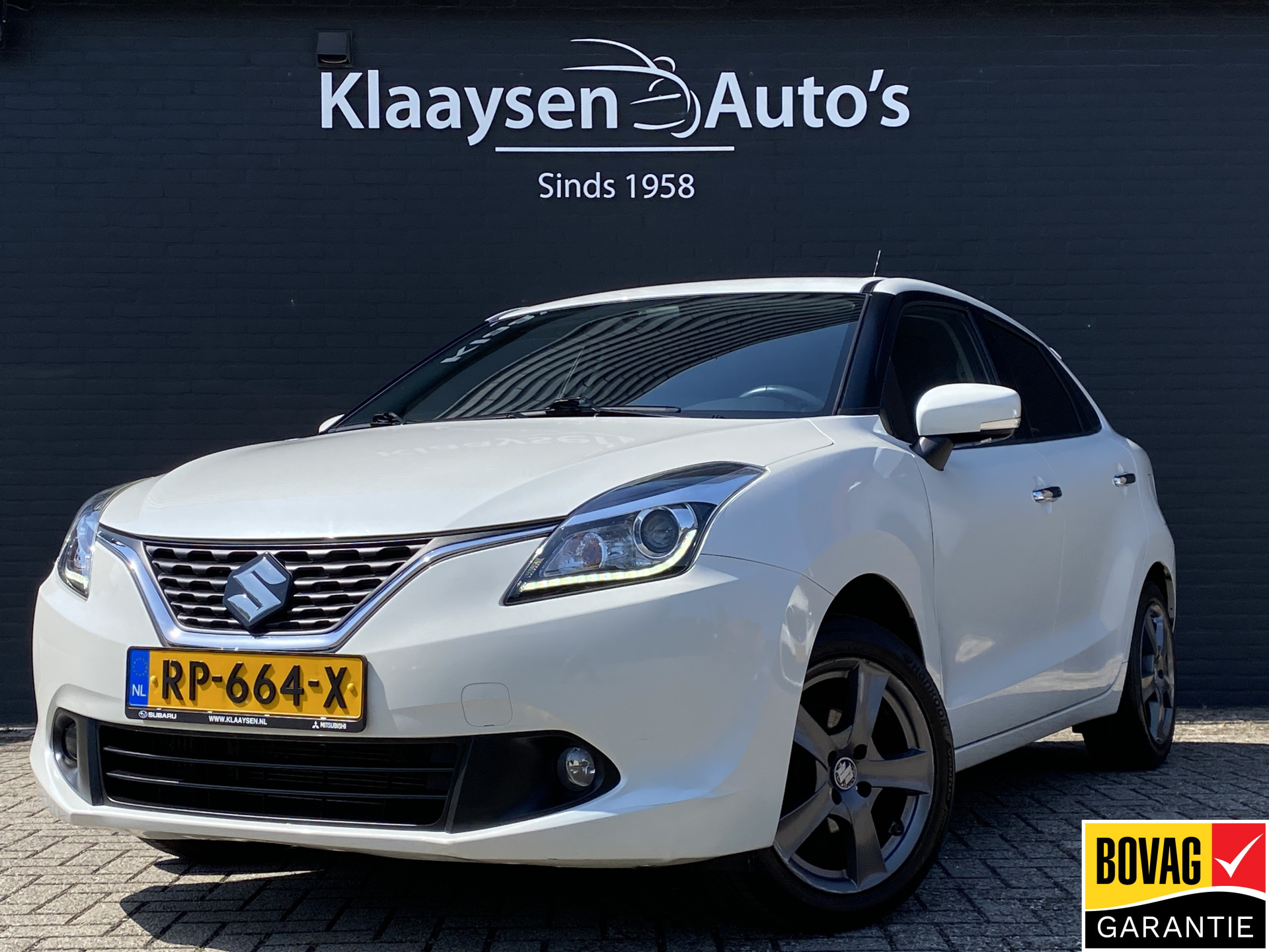 Suzuki Baleno 1.0 Boosterjet 112 pk High Executive | navigatie | camera | trekhaak | stoelverwarming | apple carplay 2018 - voorkant