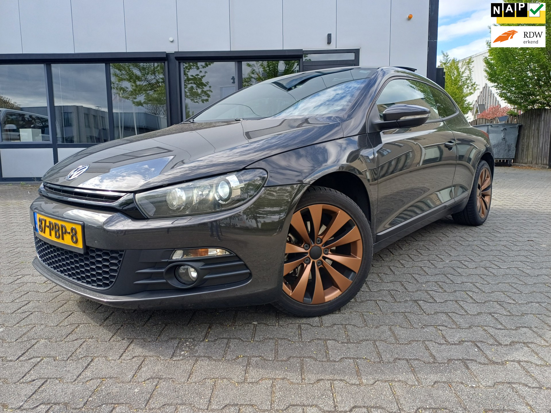 Volkswagen Scirocco 1.4 TSI Highline Plus PANORAMADAK/NAVI/PDC/XENON 2011 - voorkant