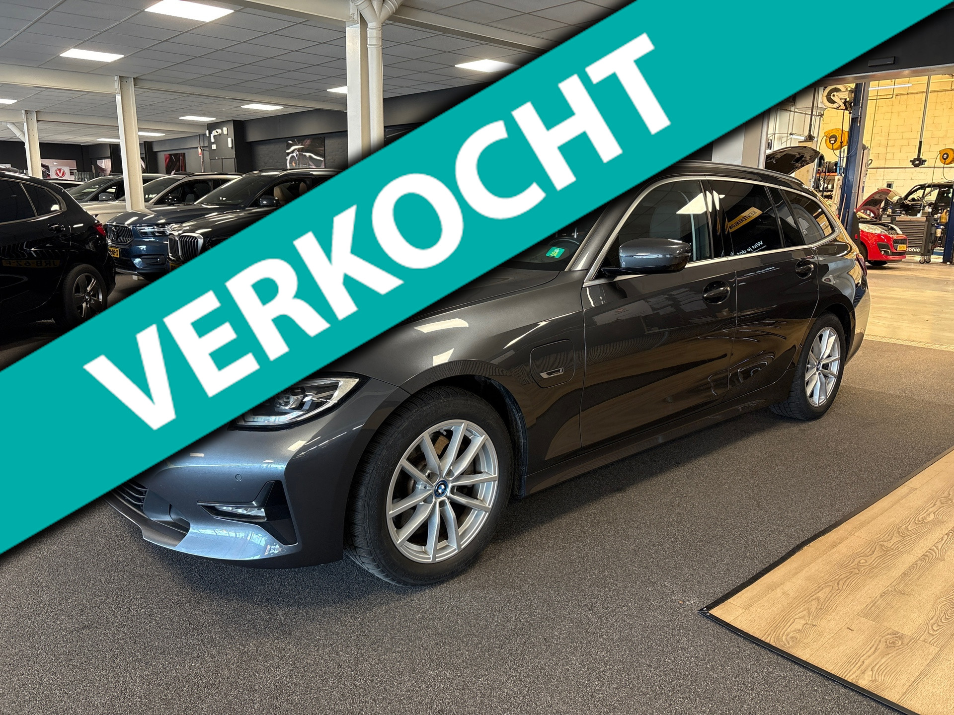 BMW 320e 320e Business Edition Plus,leer,navi,trekhaak,orig ned ,dealer onderhouden 2022 - voorkant